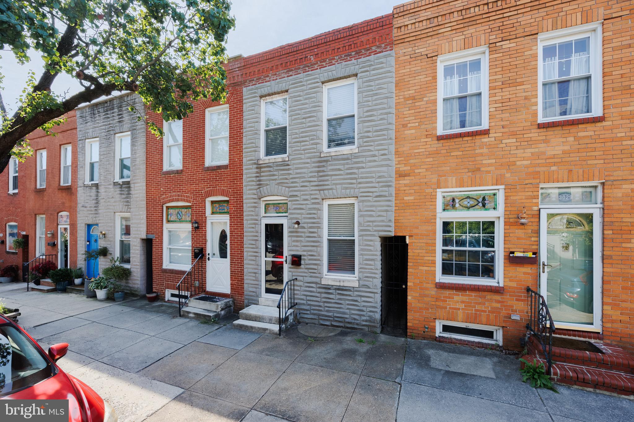 Welcome to this beautifully renovated, move-in-ready 2-bedroom, 2.5-bath Canton townhome, offering the comfort of whole-house living with stylish modern finishes. The main level features beautiful hardwood floors, an open living area, and an updated kitchen with crisp white cabinetry, quartz countertops, stainless-steel appliances, and abundant storage. Upstairs, both spacious bedrooms are complemented by renovated bathrooms featuring designer-inspired finishes, including a custom tile shower, glass enclosure, modern vanity, and elegant gold fixtures. Additional features include a main-level powder room, washer and dryer, central heating and air conditioning, and private outdoor space. Ideally located approximately 2.2 miles from Johns Hopkins Hospital, with convenient access to Baltimore's major medical and employment centers, downtown Baltimore, and major commuter routes. Just blocks from Canton Square, Canton Waterfront Park, restaurants, shopping, and more. This beautifully renovated home combines convenience, comfort, and an exceptional Canton location. Schedule your showing today!