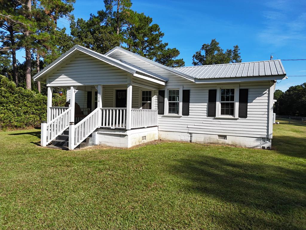 You have to see this charmingly rustic home in Thomasville, GA! This 3BR/3 bath home has tons of open living space, a wonderful living room, formal dining room and cute kitchen. The original hardwood floors give the home a rural feel, even though you are close to everything in town. Home also features a glorious sunroom/multi-purpose room, with beautiful panel walls and ceiling. And you will love your quiet time on the cute front porch. All this sits on a MASSIVE 1+acre yard with fencing, a spot for a firepit, and storage building. Call your favorite agent TODAY for a closer look!