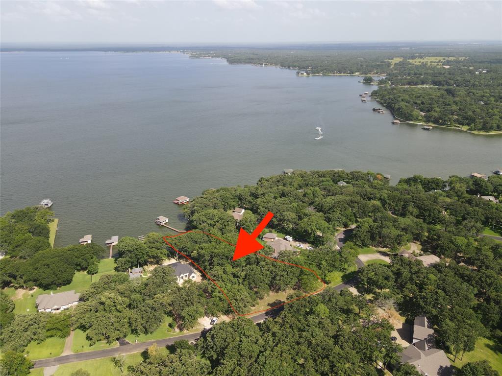 Rare opportunity for an Open Water lot in the sought-after community of the Wilderness at Richland-Chambers Lake.  Just under an acre with gorgeous views from your future build site. Featuring mature trees, a steel retaining wall, and a cleared, private wooded lot.  One of the few waterfront lots available for sale in the community! Bring your lake home plans and build your dream home in one of the most serene communities on the lake!  Minimum 2,500 square feet home required. See the POA documents for complete details.