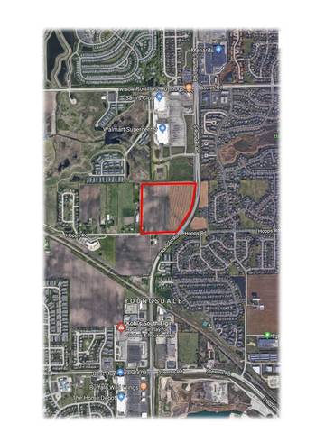 Exceptional mixed use development opportunity!  Potential for combination of commercial and multi-family.  Rare Randall Road location with 40,000 vehicles per day at a full signalized intersection.  Ideal location for strip center, fast food, gas station, convenience store, sit down restaurants, auto sales, etc.  Sewer and water adjacent, ready to develop! Adjacent to Sam's & Walmart with possible shared access.  Potentially divisible.  +/-40.4 acres