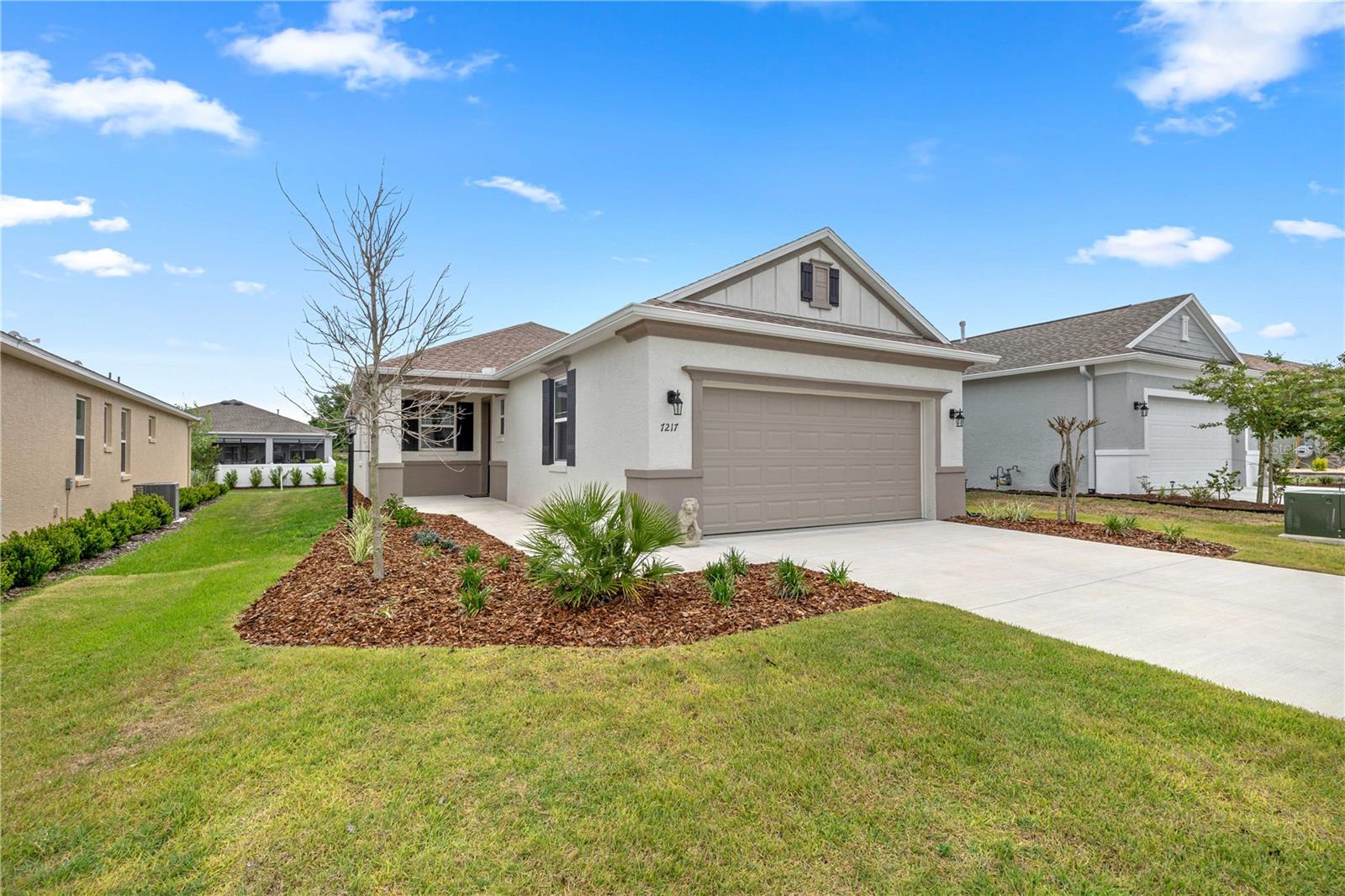 Move right in and start enjoying the Florida lifestyle—this beautifully appointed home is being sold fully furnished, offering a rare turnkey opportunity in Weybourne Landing at On Top of the World. Featuring 2 bedrooms, 2 bathrooms, and a flex room with French doors, this thoughtfully designed home offers comfort and functionality throughout. The open-concept layout connects the kitchen, dining, and living areas, enhanced by luxury vinyl plank throughout for a bright, cohesive feel. This gorgeous kitchen features an upgraded package making this truly a chefs dream! You'll find KitchenAid stainless steel appliances including a gas range, upgraded 42" cabinetry,  crown molding, quartz countertops, tile backsplash, bar seating, and a pantry.  The primary suite includes a walk-in closet and en-suite bath with dual quartz vanities and a tiled walk-in shower. The second bedroom and full guest bath are positioned on the other side of the home for privacy. The flex room is ideal for a home office, den, or craft room.  Additional features include an epoxy-coated and sealed garage floor for a clean, durable finish, along with a whole home water softener system for added comfort. Enjoy outdoor living on the screened lanai, perfect for relaxing year-round. Residents of Weybourne enjoy access to a private clubhouse, resort stye pool, fitness center, pickleball courts, dog parks and more—all just a short golf cart ride away!  Don't miss your opportunity to own a fully furnished, nearly new home in one of Ocala's most desirable communities!
