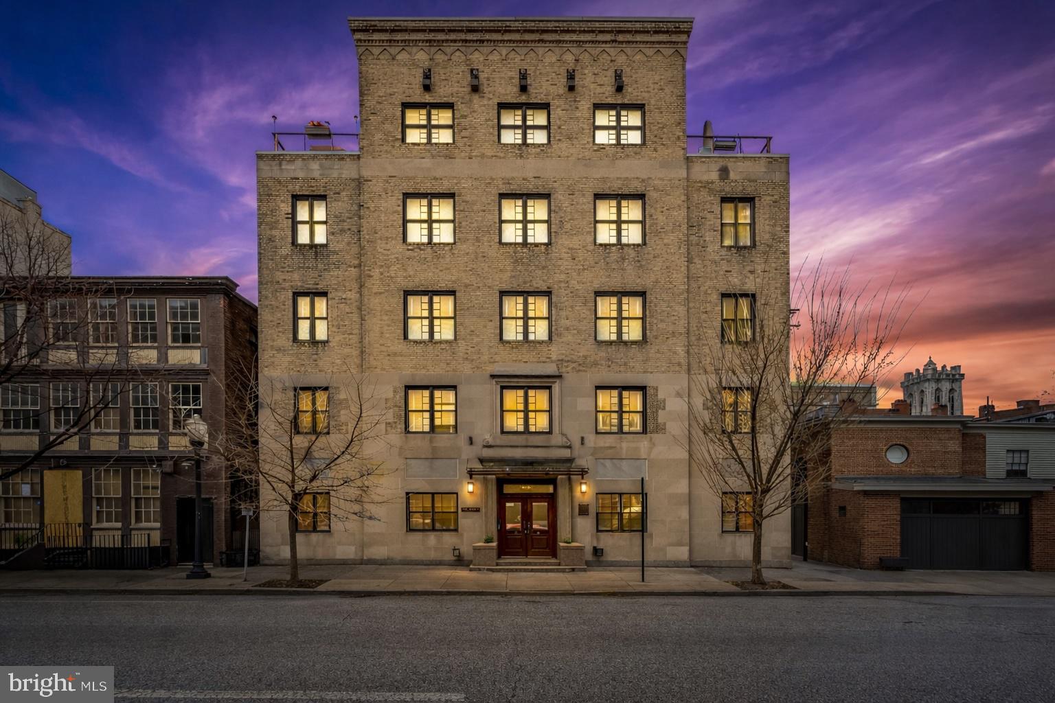 Light filled one bedroom plus den with sweeping views and sun drenched exposures throughout the day. Located in The Revels, an intimate 13 unit boutique condominium, this third floor loft style residence offers character, thoughtful design, and a level of privacy rarely found in Mount Vernon.This is an ELEVATOR BUILDING with ZERO STEPS to enter the building and zero steps to access the unit, a rare and valuable feature in a historic neighborhood.As you enter, a true foyer hallway creates a practical transition space for coats, boots, and daily essentials, keeping the main living areas clean and uncluttered. It is a meaningful layout advantage that elevates everyday living.Hardwood floors and fresh paint provide a crisp, move in ready backdrop. The kitchen is bright and inviting, with deep window sills ideal for growing herbs and modern greenery while you cook. Granite counters, tile backsplash, and stainless steel appliances installed in 2020 complete the space with both function and style.The full bath is generously scaled with double sinks and an oversized tub shower designed to wash away the stresses of the day. Dual entry from both the primary bedroom and the hallway allows for ensuite privacy while remaining easily accessible for guests.The den offers meaningful flexibility, perfect for a dedicated work from home office or guest retreat, a rare feature compared to standard one bedroom layouts.Large windows frame open views and deliver natural light throughout the day. Washer and dryer in unit. Furnace replaced in 2018. Conveys with a substantial 3.5 by 10 foot private storage locker. The unit is available partially furnished for buyers seeking a streamlined transition.The Revels consists of just 13 condominium residences. It is a self managed, well maintained building suited for discerning buyers who value stewardship, accountability, and a tightly run association.Positioned across from Baltimore School for the Arts and moments from Penn Station, this is ideal for Johns Hopkins and University of Maryland employees utilizing the shuttle, as well as MARC and Amtrak commuters. Walk to Mt Vernon Wine and Spirits, The Coral Wig, Sugarvale, Cafe Fili, The Helmand, museums, parks, and the cultural core of the city.For the buyer seeking light, layout, accessibility, and location in a boutique setting, this residence delivers.*The owner is selling a few pieces of furniture if the buyer is interested.