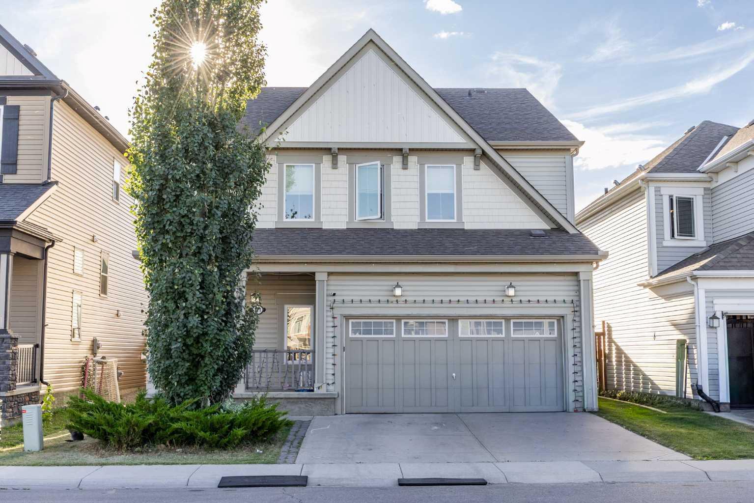 Welcome to this spacious family home in the highly sought-after community of Windsong! Built in 2013, this impressive property offers exceptional living space, thoughtful design, and numerous upgrades that make it perfect for growing families and entertaining alike. Step inside to a grand front entrance featuring soaring ceilings and an abundance of natural light, creating an inviting first impression. The open-concept main floor is designed for modern living and showcases a bright and spacious living room with a cozy fireplace, a  dining area, and a stylish kitchen complete with stainless steel appliances, quartz countertops, and ample cabinetry for all your storage needs. Additional features include central air conditioning, a central vacuum system, and newer washer and dryer. Upstairs, you'll find a large bonus room, perfect for family movie nights, a home office, or a children's play area. The spacious primary retreat features a walk-in closet and a 5-piece ensuite bathroom. Two additional generously sized bedrooms, each with their own walk-in closets, and a full bathroom complete the upper level. The fully finished basement provides even more living space with a large recreation room and a convenient 3-piece bathroom, offering endless possibilities for family gatherings, a home gym, or a media room. Outside, enjoy the sunny south-facing backyard featuring a spacious deck, a large storage shed, and plenty of room for outdoor activities. Car enthusiasts and those needing extra storage will appreciate the triple attached garage with newly finished epoxy flooring, as well as the rare RV parking access. This exceptional home combines comfort, space, and functionality in a fantastic location close to schools, parks, shopping, and amenities. Don't miss this incredible opportunity to own a move-in ready family home in one of Airdrie's most desirable communities!