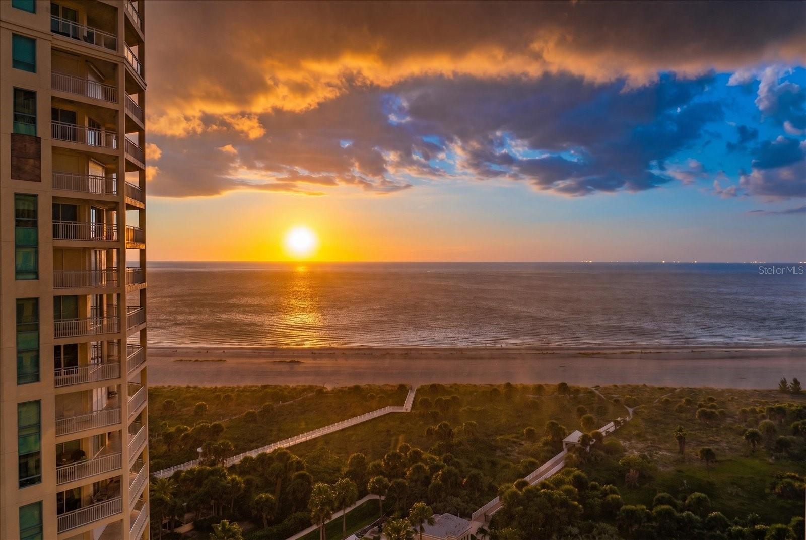 Experience the pinnacle of luxury coastal living at The Grande on Sand Key, where spectacular views, refined elegance, and resort-style amenities come together to create an extraordinary lifestyle.This turn-key furnished three-bedroom Vizcaya residence occupies a coveted southeast corner location, offering breathtaking sunrises over Clearwater Harbor and unforgettable sunsets over the Gulf of Mexico. Three private terraces, encompassing approximately 400 square feet of outdoor living space, provide the perfect setting to savor the beauty of the surrounding coastal landscape, entertain guests, or simply unwind in the gentle Gulf breezes. Spectacular location...a blank canvas to make your own.Set within 14 acres of beautifully maintained grounds, The Grande offers an exceptional collection of resort-style amenities, including multiple beachfront swimming pools, tennis courts, a state-of-the-art fitness center, elegant social rooms, billiards, and the peace of mind of 24-hour guard-gated security and concierge services.Here, luxury extends far beyond the residence itself. It is found in the effortless convenience of personalized service, the comfort of a secure and private environment, and the extraordinary privilege of living surrounded by the natural beauty of Florida's Gulf Coast.At The Grande on Sand Key, luxury isn't simply a lifestyle—it's an experience where comfort, security, and convenience come together seamlessly, and every day feels like a getaway.