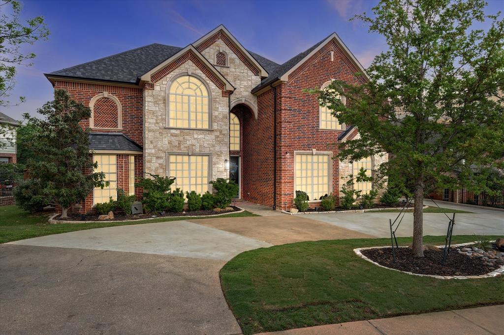 Updated Highland Village 5-bedroom home with soaring ceilings, and an open concept. Freshly painted, new fixtures, wood floors, and beautifully updated bathrooms showcase modern finishes, upgraded fixtures, and a clean, contemporary feel that elevates the overall living experience. The thoughtfully designed floor plan offers a private primary suite on the main level, complete with a versatile flex space ideal for a home office or optional sixth bedroom. Upstairs, you’ll find four generously sized bedrooms, along with an expansive game room and a dedicated media room. Outside, enjoy a large backyard with plenty of room to relax, play, or entertain, along with a circular drive and a three-car swing garage that adds both function and convenience. Located just moments from the community clubhouse, pool, tennis and basketball courts, parks, and playground, this home offers the ideal blend of comfort, space, and lifestyle.