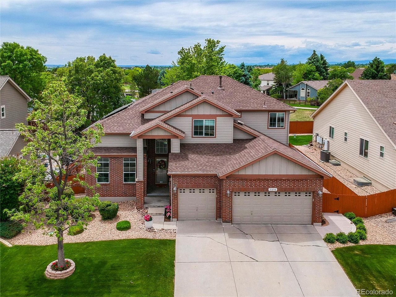 Don't miss this exceptional home in the popular Marshall Lake subdivision! In like model home condition, this beautifully maintained two-story home offers 3 bedrooms, 3 bathrooms, and an impressive 3,777 total square feet with over $80,000 in seller upgrades and premium finishes.The spacious main floor features an open and inviting layout with a formal living room, dining room, family room with soaring 18-foot ceilings, powder bath, utility room, and a luxurious main-floor primary suite with a 5-piece bathroom.The gourmet kitchen has high end appliances, plenty cabinetry and counter space, a center island, built-in desk area, and a sunny breakfast nook.Upstairs, you'll find a versatile 14' x 18' loft perfect for a home office, recreation room, media space, or potential additional bedroom, along with two generously sized bedrooms and a full bathroom.The unfinished basement with crawl space offers possibilities for future expansion and customization.Outside, the professionally landscaped yard creates a private retreat. Enjoy the fully fenced backyard featuring a multi-level concrete patio ideal for entertaining or relaxing, a utility shed for extra storage, and a convenient concrete walkway leading to the front yard.Additional features include solar panels through Sunrun, providing energy efficiency and reduced electricity costs for added long-term savings.Ideally located near the neighborhood park and playground, Trail Winds Recreation Center, athletic fields, walking trails, and dog park, with easy access to major streets and highways.This beautifully upgraded home truly has it all. Make this your home today!