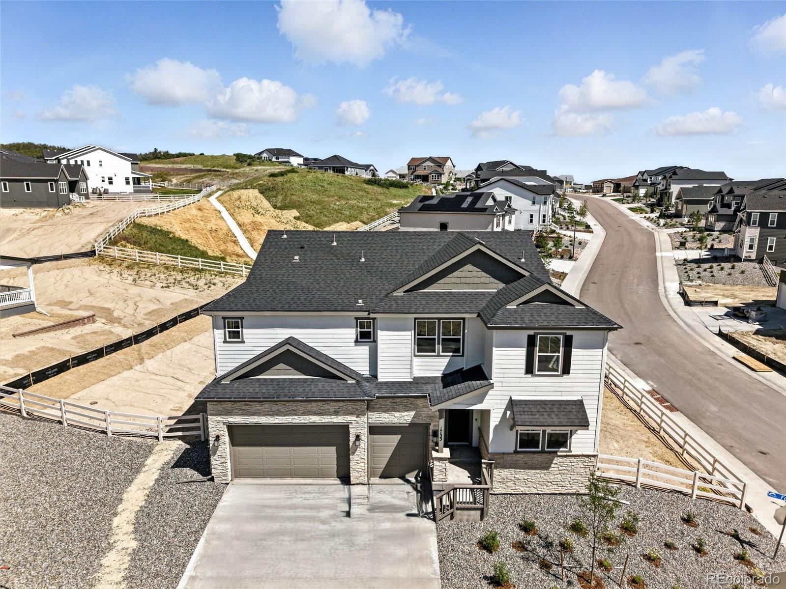 New Construction - Ready Now! Built by America's Most Trusted Homebuilder. Welcome to the Copper at 1733 Fox Trotter Point in Hillside at Crystal Valley. The Copper offers the perfect blend of flexibility and elegance. The open kitchen features an eat-in island and large walk-in pantry that flows into the dining area and great room with soaring ceilings—ideal for gatherings. A formal dining room sets the stage for special meals, while the main floor study adds function. Upstairs, unwind in the luxurious primary suite with a 4-piece bath and impressive walk-in closet. Three additional bedrooms, two full baths, a loft, and laundry room round out the second floor. Set between Denver and Colorado Springs, this community features oversized lots, preserved open space, and access to award-winning Douglas County schools. Enjoy resort-style amenities including a rec center, trails, and parks—all with a low .58% tax rate. Additional highlights include: unfinished basement with plumbing rough-in, 8'x12' sliding glass door from great room to covered outdoor living, 8' doors on second level, enlarged shower at primary bath, additional sink in upstairs secondary bath, craftsman railing and spindles at stairs, white quartz countertops and white cabinets throughout. MLS#2169840