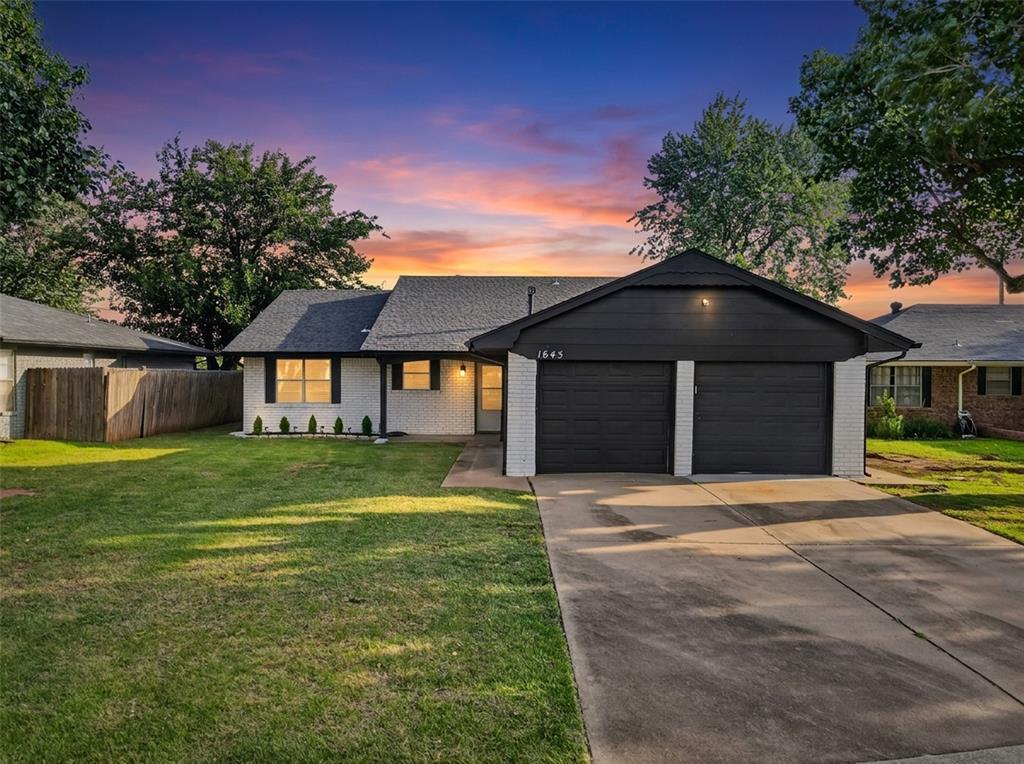 Beautiful, spacious, and turn key ready!!! You will love the updates: Granite Countertops throughout, New Carpet throughout 7/14/2026, Painted Kitchen & Hall Cabinets - Both Bathroom Vanities & Woodwork 6/2026, Gutters 4/17/2026, HVAC Unit 5/21/2024, Electric Panel 12/2024, Sliding Doors that open to the back patio 10/2024, and Storm Door - Shower Head in hall bath - Kitchen Faucet in 2/2026. The North garage door was tuned up 12/2025 which included a garage door opener. 2 new fans still in boxes will remain with the home for the new owners to enjoy. Both full bathrooms have been updated. The primary bathroom offers a tiled shower with built-in seating area. The hall bath provides a tiled shower with a porcelain soaking tub. All bedrooms are good sizes. In the kitchen you’ll enjoy tiled backsplash, a gas cooktop, vent hood, and breakfast bar. The dining area is filled with natural light, perfect for savoring your morning coffee as you watch the Oklahoma sun rise. The open living room is ideal for entertaining or relaxing and offers a wood burning fireplace with mantle, built-in bookshelf’s, and modern sliding doors that make the back patio easy to access. The backyard has plenty of space for outdoor gatherings and provides a slab for outdoor furniture. This home is conveniently located minutes away from several parks, shopping, restaurants, Lake Hefner and easy highway access.