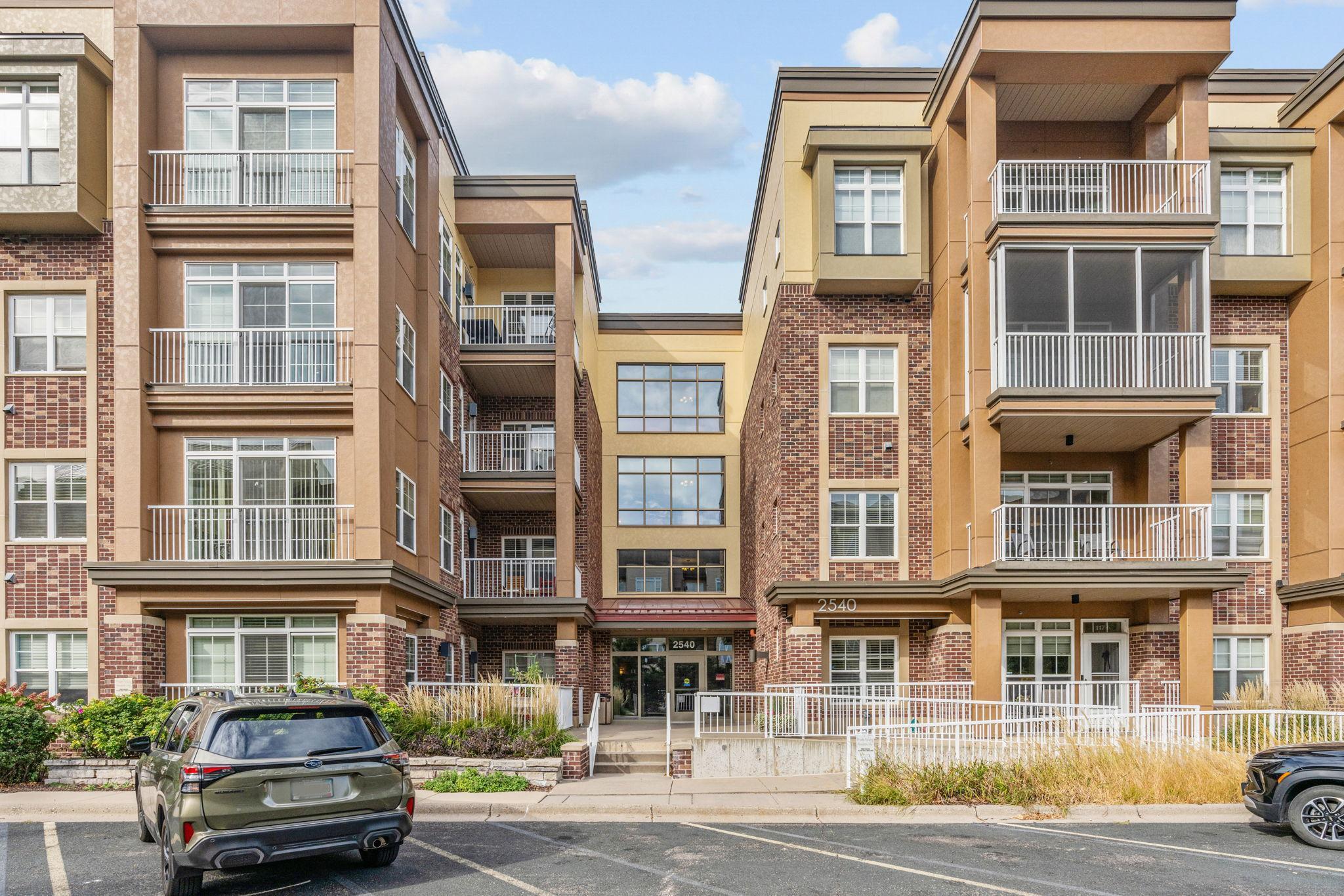 Welcome to hassle-free, updated luxury at Silver Lake Village Condos in St. Anthony, MN! This turnkey condo offers the perfect blend of prime walkability and a truly transformed interior. Significant updates—totaling over $18,790—have made this unit shine: enjoy a modern, refreshed kitchen featuring new Quartz Countertops, Tile Backsplash, Deep Sink with Faucet, professionally Refaced Cabinets, and a full set of new Appliances. Throughout the main areas, you'll find beautiful, durable Engineered Wood Flooring and updated LED Lighting fixtures, meaning all the big expenses are already covered for you. And, you only pay Elec and Gas, all other utilities are part of your dues including cable and internet. Beyond your door, the Silver Lake Village community provides a superb, low-maintenance lifestyle with amenities that include a Fitness Center, a Multi-Use Community Room, Library, Workshop, Rentable Guest Suites, and the convenience of Elevator Access and Heated Underground Garage Parking. Location is everything, and this address boasts a fantastic Walk Score, placing you just steps from essential shopping like a grocery store, local restaurants, cozy coffee shops, and beautiful area parks with fountains and walking paths. Come see the ideal combination of a pristine, updated home and an unbeatable St. Anthony lifestyle!