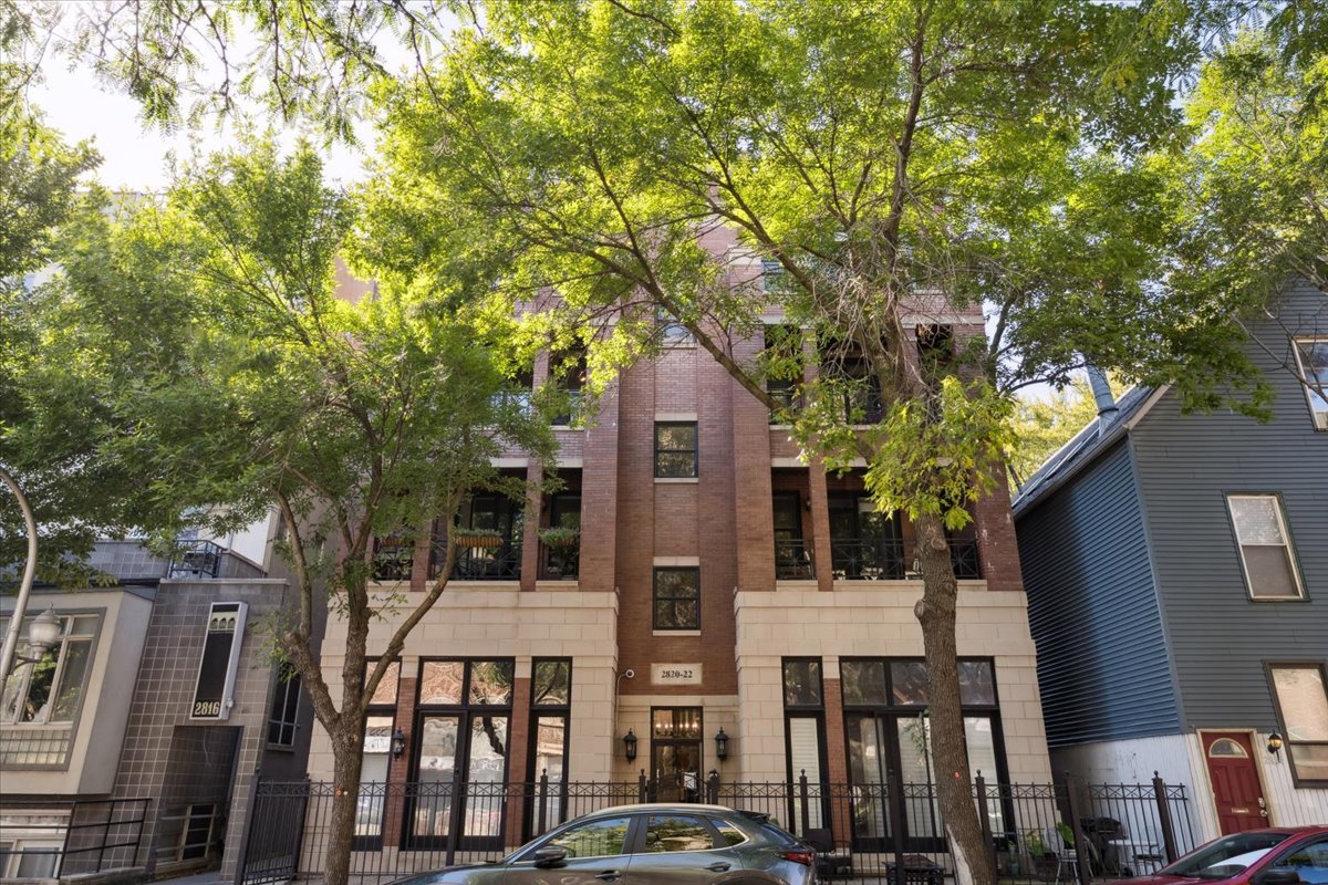 Discover the best of Lakeview luxury living in this stunning penthouse, set on a picturesque tree-lined street. This sophisticated two-bedroom, two-bath residence features an open-concept floor plan with tall ceilings, hardwood floors, sun-drenched interiors, modern finishes, and a private rooftop deck-a rare combination of style, comfort, and convenience in one of the city's most desirable neighborhoods. The show-stopping private rooftop deck sets this home apart. It's an entertainer's dream and the ultimate retreat for relaxation. Whether hosting summer gatherings or enjoying a quiet evening under the skyline, this private outdoor oasis is unmatched in Lakeview. Inside, the spacious chef's kitchen is the heart of the home, offering granite countertops, stainless steel appliances, and designer lighting, perfectly suited for both intimate dinners and large-scale entertaining. The living room is anchored by a stylish fireplace, creating a warm focal point and inviting atmosphere, while oversized windows frame treetop views and fill the space with natural light. A front terrace just off the main living area provides the perfect spot for everyday grilling and casual dining. The serene primary suite provides dual walk-in closets and a spa-like bath complete with stone countertops, custom cabinetry, and an oversized shower, while the secondary bedroom and full bath are equally well-appointed, ideal for guests, a home office, or flexible living needs. The open layout allows for seamless flow between living, dining, and kitchen spaces. Every detail, from the custom millwork to the designer fixtures, speaks to modern comfort and elevated style. One car garage included!