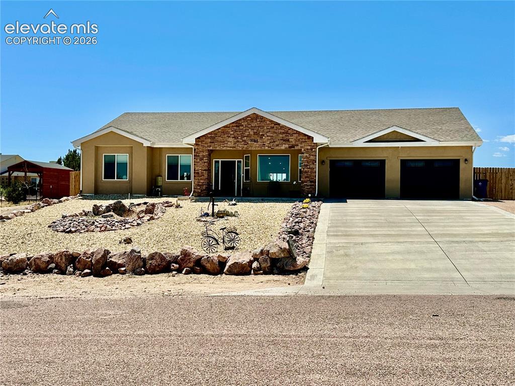 Welcome to an exceptional Pueblo West property offering modern comfort, thoughtful upgrades, and outstanding versatility on 1.38 acres. This beautifully maintained one-level home features 2,246 square feet of living space with 3 bedrooms plus a dedicated office and 2 full bathrooms, all in immaculate condition. Step inside to an open and inviting layout highlighted by a spacious living room with cathedral ceilings, LED can lighting throughout, and an electric fireplace with remote. The dream kitchen is the heart of the home, showcasing an oversized island, abundant workspace, and seamless flow for entertaining. The private primary retreat offers a spa-like experience with a walk-in shower and Jacuzzi tub. Additional features include on-demand hot water, radon mitigation system, and smart home technology including security and HVAC systems, plus permanent holiday LED lighting installed under the soffits. Outdoor living is just as impressive with a fully sprinklered front and back yard, including lawn, roses, and tiered flower beds. Accent lighting in the front and photo-eye perimeter lighting in the backyard. Car enthusiasts, hobbyists will appreciate the attached 2-car garage (25x20) w/ an extended 28’ deep bay, and a outstanding 30x30x12 shop which is fully finished & insulated (R19 equivalent), pro panel steel siding and roof, radiant barrier ceiling, electric heat and AC, 100-amp service, 50-amp welding, smart garage door openers. Water service available at shop