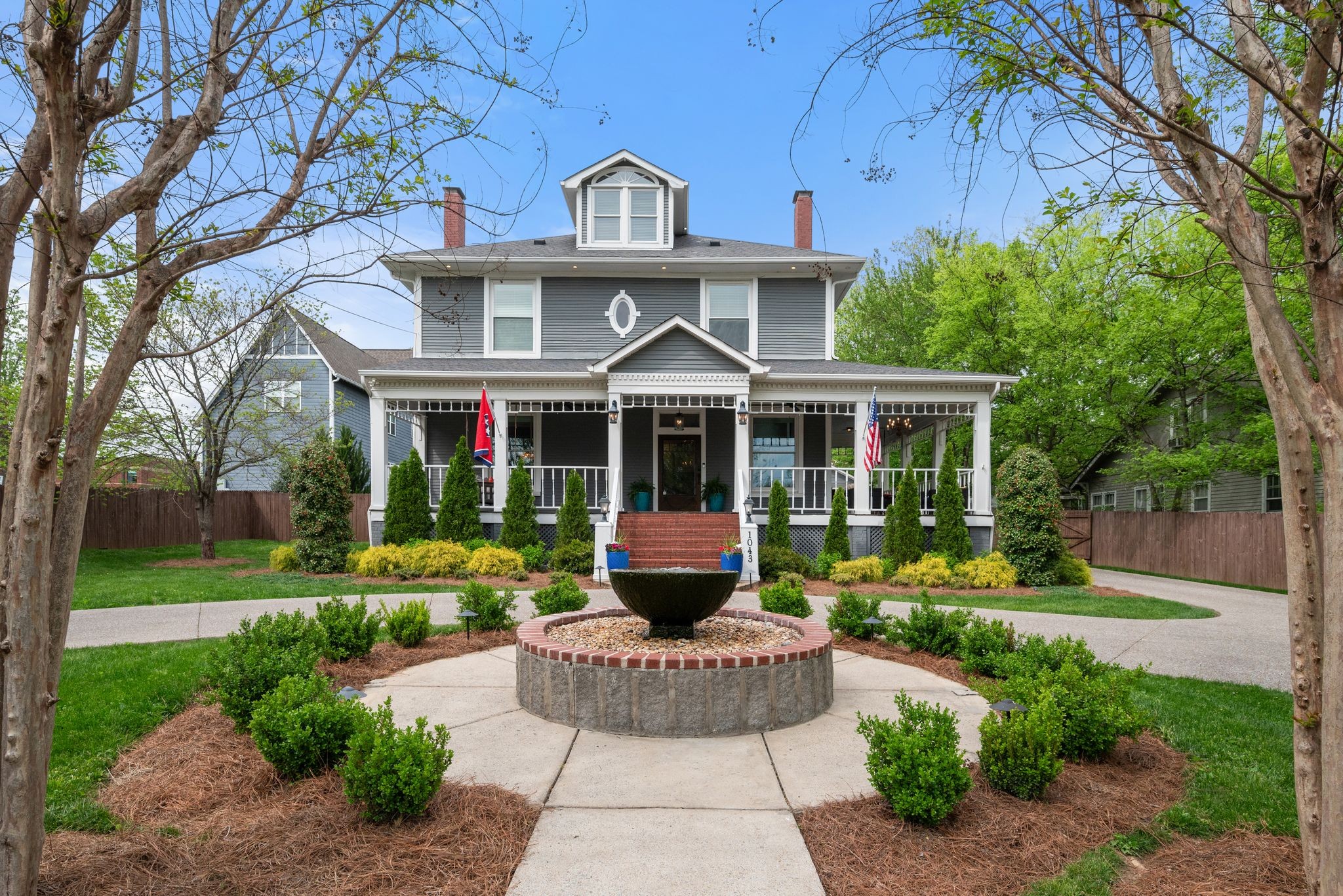 Step into a rare blend of historic elegance and modern luxury at the Josephine L. Anderson House—a masterfully restored 1912 American Foursquare residence graced with Queen Anne-style details. This architectural treasure features a sweeping wraparound porch with intricate spindlework, seven fireplaces (two with functional ventless gas logs), and a grand interior rich with original wood paneling, transomed doors, and finely crafted inlaid hardwood floors. Thoughtful upgrades meet timeless character throughout, including a gourmet kitchen, luxurious first-floor guest suite, and designer finishes that complement the home’s historic charm. Outdoor living is equally impressive with a heated saltwater pool, in-ground spa, lush landscaping, and a fully fenced .53-acre lot—complete with a 2-car detached garage. Recently approved for a Detached Accessory Dwelling Unit (DADU) zoning overlay, this property opens the door to additional income through long-term or short-term rental options—enhancing its appeal as both a personal sanctuary and a smart investment. All outdoor furnishings, decorative accents, pool and spa equipment, built-in surround sound, piano, and other curated touches are included—creating a turnkey experience rarely found in a home of this caliber. Property is also available furnished. Own a piece of Nashville’s history, beautifully reimagined for modern living. Priority zoning for Haynes Middle and East Nashville Middle Schools.  Priority Zoned for East Nashville Magnet High School. Owner agent.  Interior furnishings are not included in list price and will be sold under a separate bill of sale outside of closing.