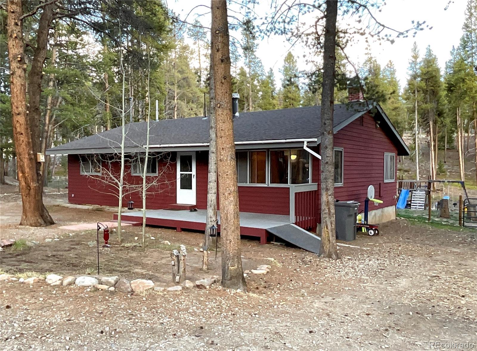This attractive open plan 3 BR / 1 BA ranch style home in Turquoise Lake Estates sits on a private, wooded 0.51 acre parcel. The spacious back yard is fully-fenced for dogs and offers a children’s play-set. The back deck is perfect for that morning cup of coffee or enjoying some sun while facing the pine trees on the back of the lot. There are 3 quality storage sheds for tools and toys. The home is heated and operated with solar power and a wood stove (the solar panels are owned and convey with the sale). There is propane on the property also (but the current owners do not use it and it is not connected). Much of the laminate wood flooring is newly-installed. New septic, well pump, water heater, and water pressure tank. This is the absolutely best-priced home in the neighborhood. Enjoy the convenience of being near town but having privacy off of County Road 4. This home is also not far from the Turquoise Lake Rec Area and the golf course. If you want quality of life in Lake County, this property offers it.