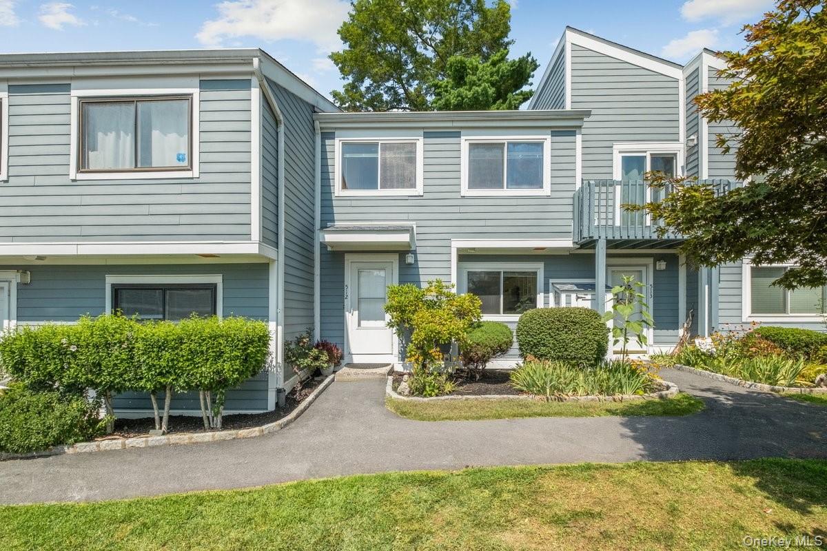 Nestled in the vibrant heart of Mount Kisco Village, this warm and inviting home perfectly blends comfort with convenience. Stroll to nearby restaurants, friendly bars, and unique shops that give the town its charm.  Short distance to community amenities of additional parking - both street and municipal, basketball court, playground, baseball field and bus stops. Enjoy local recreation at nearby hiking trails and area golf courses!

Inside, you’ll find a spacious, light-filled living area with wood floors and a cozy wood-burning fireplace. The living room with heated floors opens through two large sliding glass doors to a private deck and fenced yard—perfect for relaxing or entertaining.

The eat-in kitchen features crisp white cabinetry, generous countertops for meal prep, and a convenient laundry closet. Just off the kitchen, the dining room overlooks the living room, with a few open steps creating an airy, connected feel.

Upstairs, the primary suite offers a wall of closets and a private en suite bath. Two additional bedrooms share a full hall bathroom.  Unfinished attic is offers storage possibilities.

Recent updates include a new roof in 2022. The community offers a refreshing outdoor pool for warm summer days, and pets are welcome. Commuting is a breeze with the Metro-North station just minutes away.

Warm. Welcoming. Updated. This isn’t just a house—it’s a lifestyle upgrade in the heart of Mount Kisco.