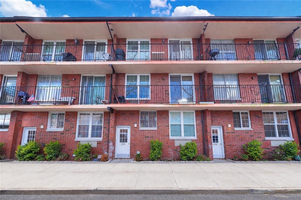 Welcome to 316 101st St #41E — a rare and spacious 2-bedroom, 2-bath co-op offering approximately 1,100 sq ft of comfortable living space, complete with an assigned parking space behind a private gate — a true convenience in Bay Ridge!Situated in a well-maintained 3-story co-op building, this top-floor unit offers maximum privacy, quiet, and incredible natural light throughout the day.This unique home features soaring high ceilings at the center, creating a bright, open, and dramatic living space rarely found in co-op living.The well-designed layout includes two generously sized bedrooms, including a primary suite with its own bathroom. The expansive living and dining area is perfect for both everyday living and entertaining.Enjoy front and back balconies, ideal for relaxing and taking in open views, including glimpses of the Verrazzano Bridge and Hudson River.Additional highlights include split A/C wall units, hardwood floors throughout, a functional kitchen with ample cabinet space, private storage, laundry room, and a community bike area.Conveniently located near shopping, dining, parks, and public transportation.  Easy to show — don’t miss this opportunity!  Easy to show — don’t miss this opportunity!