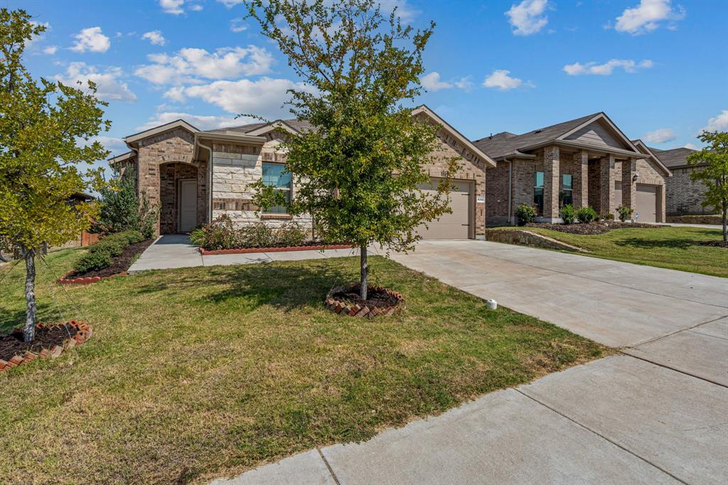 This pristine move in ready home is less than three years old.  Just 3.5 miles from Eagle Mountain Lake, enjoy weekends of boating, fishing, and soaking up the sun. The kitchen features stained cabinets, granite countertops, stainless steel appliances that include the refrigerator, an oversized island.  Open concept living with wood look tile flooring.  Conveniently located near shopping, dining, Eagle Mountain Park, and the Fort Worth Nature Center, with easy access to Lockheed Martin, JRB, and downtown Fort Worth.