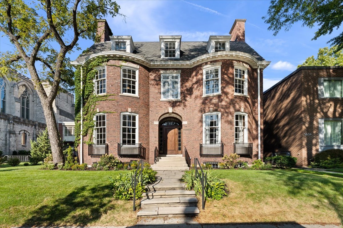 5638 South Woodlawn Avenue represents a unique opportunity to own a piece of Chicago's architectural heritage. Designed in 1911 by celebrated architect Howard Van Doren Shaw for publishing executive Henry Hoyt Hilton and his wife Charlotte, this three-story Federal-style residence embodies timeless elegance and thoughtful design. Shaw, later honored with the American Institute of Architects' Gold Medal, was renowned for his refined use of symmetry, proportion, and classical detail-hallmarks clearly evident here.  Meticulously restored and updated, the massive 8,000-square-foot home blends original grandeur with modern luxury. Historic details - majestic fireplaces, gleaming hardwood detailing, and an elegant main staircase-are complemented by a new chef's kitchen, renovated baths, a reimagined third-floor great room, as well as the practical including a spacious laundry. The lower level adds a workout room, media room, and abundant storage. With six bedrooms, five full ensuite baths, and three half baths, this residence offers both scale and versatility for modern living.  Set in the heart of the University of Chicago community, this historic property is as livable as it is significant - a piece of architectural history, seamlessly blending Shaw's timeless vision with contemporary elegance in one of Chicago's most celebrated neighborhoods.