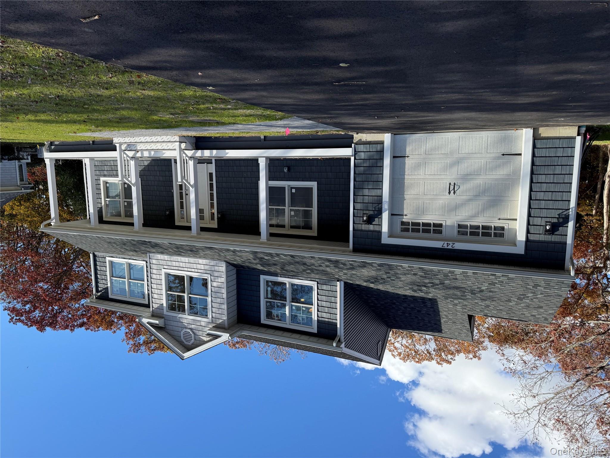 Welcome!  Through the front door foyer...your eyes will be drawn to the high ceiling and the sturdy yet stylish woodwork of the staircase banister, which blends traditional craftsmanship with current design.  The bountiful outdoor light in the dining area will draw you in further; and the warmth of the cozy fireplace will invite you to stay. Enjoy the ambience of these amenities that are also open to the airy living room! 
    Light and spacious, this brand new breathtaking  kitchen has an abundance of detailed wood cabinetry, stunning quartz countertops, and new Energy Star stainless steel appliances;  all which embrace a generous island for extra seating,  entertaining, and cooking. Gather and enjoy all the desired special touches in this outstanding heart of the home! 
     Close by, the pantry and conveniently-located laundry/mudroom with enclosed washer/dryer lead to the second entrance through the one and a half car garage.
    From the kitchen, turn to the formal dining room to see more of the elegant  architectural details before heading upstairs to the master suite, three additional bedrooms, linen closet, and extra bathroom.
    The ample master suite has two closets including a spacious custom-built walk-in closet,  and a thoughtfully-designed master bath: complete with a large tub, a detailed shower, double vanity,  and a privacy door for the commode.  
   This home is built on a full basement with a separate outside entrance,  has a doublewide driveway, and many desired current energy-saving features for your comfort and budget including Andersen windows throughout. Take a look, and you will see the professional quality care invested in this brand new build!  
   The spacious deck and plentiful trees in the backyard are waiting just for you to enjoy the great outdoors!   Take the sidewalk for a stroll to local parks and conveniences, as well as the elementary school and ballfields.
  Your dream home awaits your own personal touch to the neutral colors decor. Come to see this sparkling new gorgeous gem, and then make it your own!