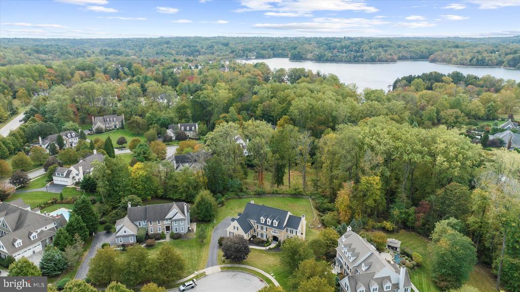 Welcome to 6 Greystone Circle, Newtown Square, PA 19073.  Located in desirable Springton Reserve on a quiet cul-de-sac street.  In the winter you can see part of the Springton Reservoir! Major renovations in 2014 included a new kitchen with an expanded island, newer floors, drywall, added cabinets in the office and an updated interior sprinkler system as well as an exterior rear yard only sprinkler system.   There is a state of the art Stream Labs interior water monitoring system as well as a fire and burglar monitoring system through Vector for safety protection (insurance companies love this).  Sonos is on the first floor.  This five bedroom home has five full baths and two powder rooms, a full finished daylight basement with bar and wine storage room.   Fun times in this bright entertaining  basement with sliding glass doors to the paver patio leading to the fenced in back yard and decks.They spared no expense on the new roof they put on in 2025 and there is a newer water flow protection system.  The newer expanded Trex deck is made up of 3 levels and makes the expanded outdoor living space fun and comfortable.Just recently, the owners redesigned the front door to be a clear view double entry door for a brighter foyer.In 2015, the owners removed all stucco and every window was removed while replacing the flashing.  A whole house generator was added in 2020.  All 4 bathrooms on the 2nd floor were updated with granite counter tops and fixtures in 2019.  The list goes on and on as this owner took such good care of this beautiful home.  Over the past 11 years, there has been over $500,000 of improvements and updates to this fabulous home.  It feels like new!One year home warranty included.  Please note that the room measurements are provided as a convenience but all buyers must do their own diligence to verify accuracy of these measurements and not rely on the ones listed here.