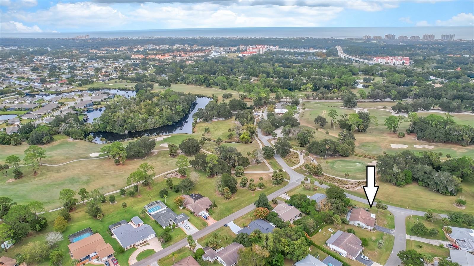 Welcome to Country Club Cove – One of Palm Coast's Original and Most Charming Neighborhoods! NO HOA! Discover the perfect blend of quality construction, modern updates, peaceful surroundings, and the ultimate Florida lifestyle! Built by the renowned ITT Levitt Brothers, this solidly constructed home is nestled in the established Country Club Cove neighborhood, offering beautiful golf course and country club views without the restrictions or fees of an HOA! Featuring a BRAND-NEWROOF IN 2026, tile flooring throughout with NO carpet, beautifully updated kitchen and bathrooms, and plenty of room for the whole family to relax and unwind. Love golf? You'll love being able to walk to the nearby country club, enjoy the beautiful golf course surroundings, and even practice your short game on your very own putting green! Outdoor living is just as inviting, with a wonderful side-yard patio already set up for entertaining, relaxing, and making memories with family and friends. Sliding glass doors lead to an impressive 40' x 7' screened-in back patio, offering even more space to enjoy Florida's beautiful weather year-round! One of the best things about this location is the peaceful, laid-back atmosphere! Tucked away from the hustle and bustle of Palm Coast's busy commercial areas, Country Club Cove feels like a quiet retreat, yet you're just minutes from gorgeous beaches, shopping, restaurants, and all the wonderful activities the Florida coast has to offer. Spend your days kayaking, fishing, biking scenic paths, exploring waterfront parks and nature trails, playing golf, or enjoying fabulous waterfront dining! Whether you're searching for a full-time residence or seasonal escape, this home truly offers the best of both worlds—quiet neighborhood living, beautiful surroundings, and endless coastal adventures just minutes away! Professional photos coming soon!