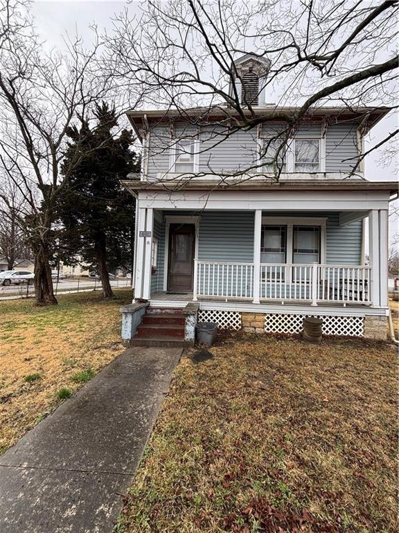 4 BR, 1.5 bath Eastlake-influenced Victorian home bult in 1888 is rich with historic features including an ornately carved front door with stained glass insert, front and rear stairways, walnut overmantel above the LR fireplace, 3 total fireplaces in the home with tiled hearths & inserts.  Fireplaces are not operational.  Much original ornamental woodwork, pocket doors and the elaborate full-height mantels of both Renaissance Revival and Turkish influence continue to be striking features in the home.  Rare built-in closet desk in the DR, full covered front porch, rear deck and fenced yard are all elements of this home. The home was featured twice in the area "Homes for Holidays" tour.  Many features have been adapted for modern living and comfort.  The home sits on a spacious corner lot with two, 2-car detached garages for total space of 4 cars.