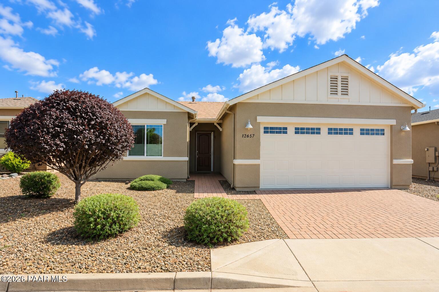 Quailwood Meadows! Wonderful home located south of Prescott in Dewey, AZ. Built in 2015. New roof October 2022 with warranty. Well-kept three-bedroom, two bath house with open living room/kitchen concept. Fireplace in main living area with high ceilings and 8-foot doors. Large, walk-in pantry, plus additional laundry room. Granite kitchen counter-tops. Covered back patio with BBQ gas line. Smoke-free, pet-free home. Epoxy floors in garage. Low maintenance yard with views to the Bradshaw Mountain Range. Enjoy all the Quailwood Meadows has to offer with a complete Clubhouse, with sports courts, gym, swimming pools and parks. Easy commute to Phoenix on Highway 69. Near several restaurants and Mortimer Farm which hosts line dancing, holiday and seasonal events.