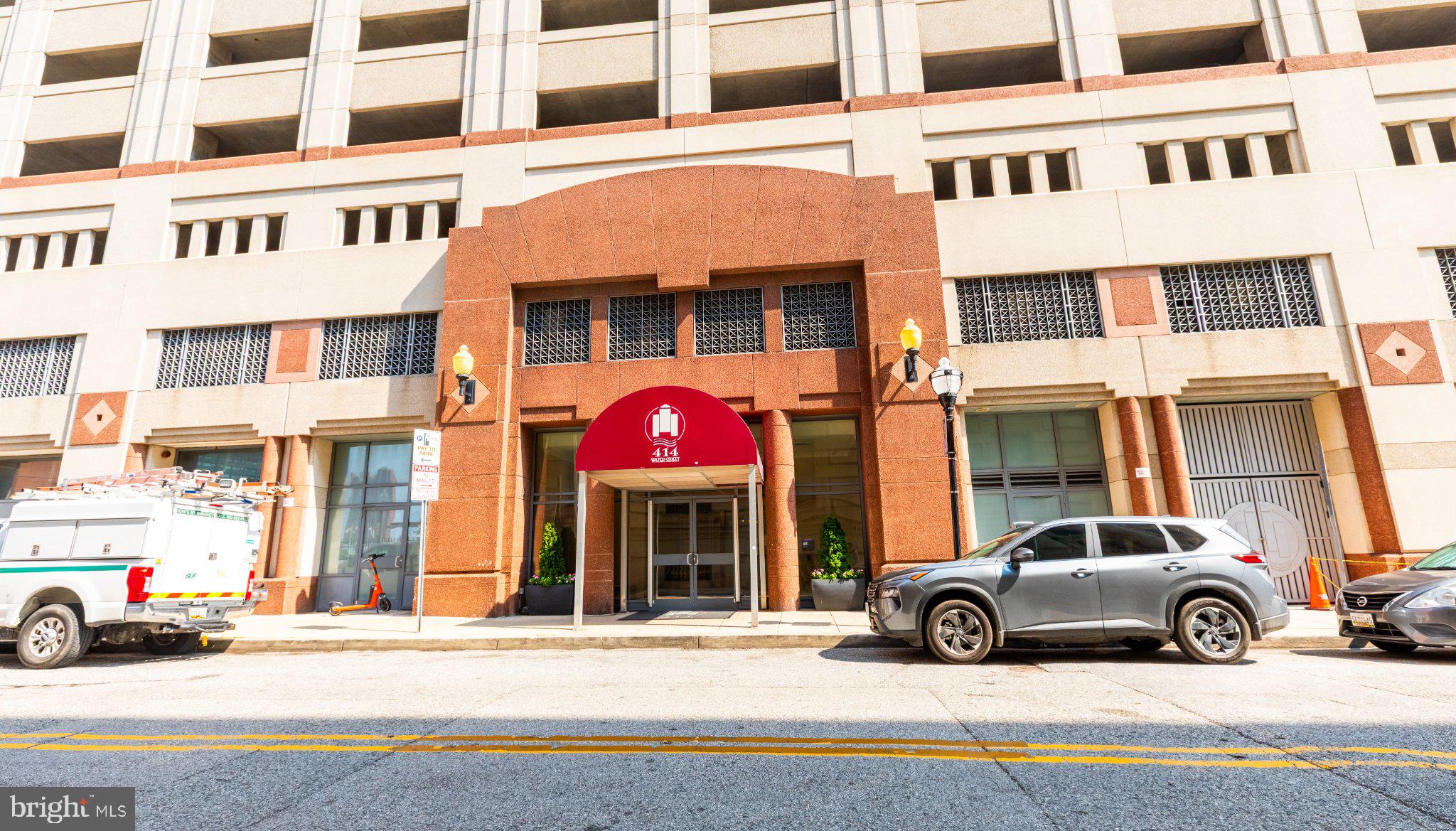 Elevated Downtown Living with Parking, Balcony, and Rare Same-Floor Storage!Welcome to Unit 2007 at 414 Water Street, a freshly updated 1-bedroom, 1-bath high-floor condominium offering approximately 644 square feet of comfortable urban living and sweeping views of the Baltimore skyline. Recently freshly painted and thoroughly cleaned in preparation for its next owner, this bright, move-in-ready residence combines modern convenience with the ease of full-service condominium living.The open-concept living and dining area features wood flooring, crown molding, abundant natural light, and access to a private balcony—an inviting place to enjoy morning coffee or unwind while taking in the city views. The kitchen offers upgraded countertops, generous cabinetry, gas cooking, and a complete suite of brand-new appliances, including a refrigerator, stove, dishwasher, and microwave.Enjoy the convenience of an in-unit laundry area with a separate washer and dryer arranged in a space-saving stacked configuration—not a combined laundry-center appliance. Even more exceptional, the residence includes a rarely available approximately 4-by-6-foot private storage unit located on the same floor, directly across the hall from the apartment, providing exceptionally convenient space for luggage, seasonal belongings, household supplies, and more.One assigned garage parking space is included and is conveniently positioned near the building’s secure entrance. Residents enjoy 24-hour front-desk and concierge service, lobby security, on-site property management, a two-level cascading outdoor pool, fitness center, business center, meeting and recreation spaces, and secure elevator access. The condominium fee includes gas, water, trash removal, parking, building insurance, management, exterior maintenance, and access to the community amenities.Located approximately one block from Metro and two blocks from the Inner Harbor, Unit 2007 places downtown employment, waterfront attractions, dining, entertainment, shopping, and commuter routes within easy reach. This is a compelling opportunity to enjoy high-floor views, private outdoor space, dedicated parking, rare same-floor storage, brand-new appliances, and a freshly prepared interior—all in one amenity-rich downtown residence.