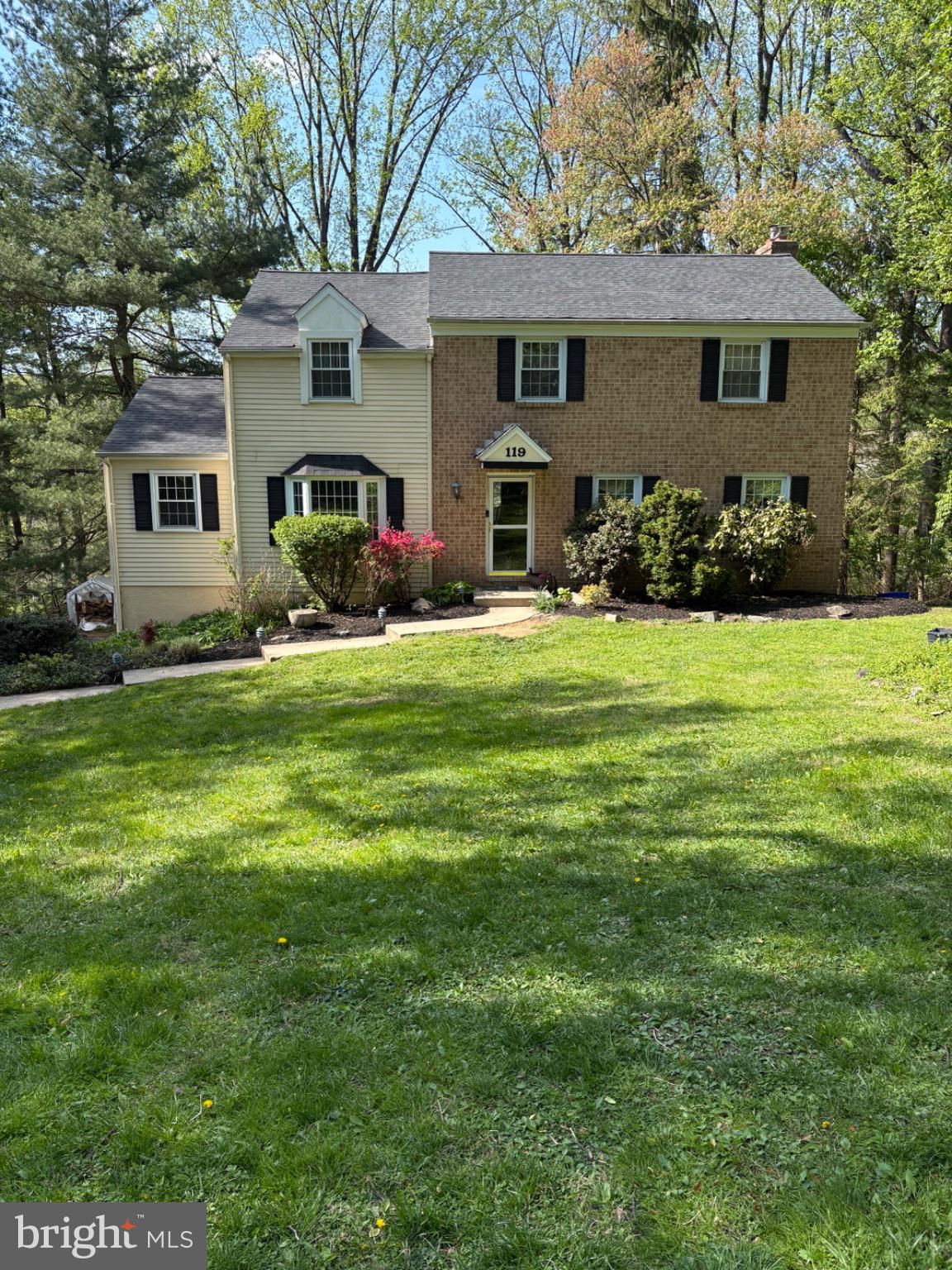 Welcome to the sought after neighborhood of Woodmont in the heart of Chester County! Set on just over an acre at the end of a quiet cul-de-sac, this lovingly maintained four bedroom, two full and two half bath colonial offers just over 3,000 square feet of living space on one of the largest lots in this highly sought-after neighborhood, all in the award-winning Downingtown Area School District. The major updates are already done: 2026 brought a new roof with a transferable warranty, new carpeting, a new retaining wall, and a freshly stained deck with new joist brackets, while 2025 added new central air, a new hot water heater, a whole-house water softener, and new tile in the kitchen and laundry. Gleaming hardwood floors flow through most of the home. The living room features French doors and custom built-ins, and the family room invites you to gather around the brick hearth fireplace with a wood/coal burning stove, complemented by built-in shelving, recessed lighting, and crown molding. The formal dining room, with its bay window and chair rail, opens to the kitchen, offering Corian countertops, a tile backsplash, plenty of cabinetry, updated appliances, and a large eating area. Step out to the elevated wood deck and take in sweeping wooded views and privacy, the perfect spot for morning coffee or watching the sunset. Upstairs, the primary suite boasts hardwood floors, two closets, and a private bath, joined by three additional bedrooms. The finished lower level, with new carpeting, a wood burning fireplace, and a powder room, opens to a private brick patio, making it ideal for entertaining. Just off Route 113 and the Route 30 Bypass, you’re minutes from schools, shopping, corporate centers, the Downingtown Library, and the Borough of Downingtown with its restaurants and favorite community events like Good Neighbor Day and Fall Fest. Welcome home!