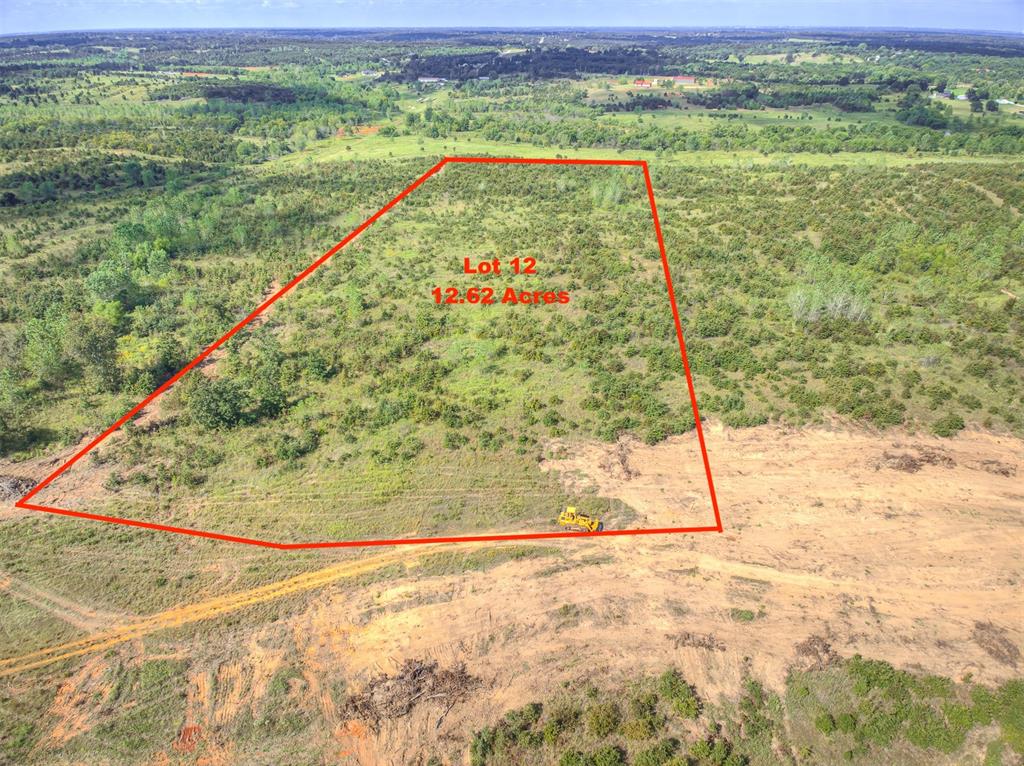 Welcome to Ridgeline Estates! Norman's newest private upscale development in East Norman at 140th and Cedar Lane Rd. Each of these 28 lots ranging in size from 10 to 20 acres have incredible character with gently rolling hills, oak and pecan trees. This lot has 12.62 acres with a gentle slope from Baxter Lane to the west end of the lot creating incredible views.  Evenings watching sunsets and the abundant local wildlife will make lasting memories at each of these wonderful homesites. This private development won't have streets completed until December, but we are making lots available now. OEC will bring electric up all the streets at no charge and provide High Speed Fiber internet. Come take a tour and pick out your future homesite. Horses allowed. Lot prices ranging from $12,500 to $20,000 an acre.