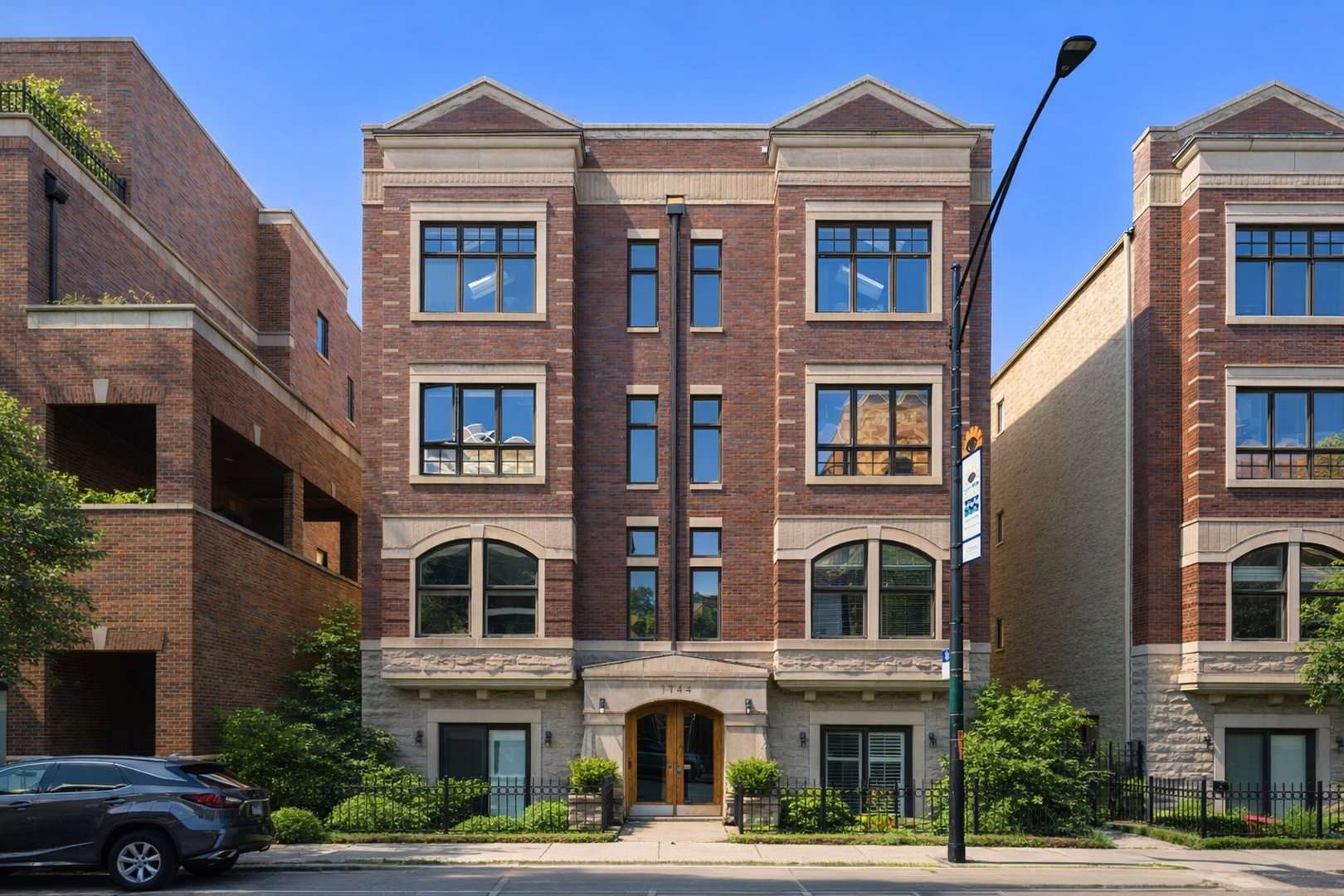 Experience the best of Lakeview living in this spacious, updated 2 bedroom, 2 bathroom condo featuring a fantastic layout, private outdoor space, and two included parking spaces! This spacious unit features hardwood floors throughout, an open living and dining area, and a kitchen with breakfast island, newer appliances, and plenty of space for entertaining. The primary suite offers a fully renovated bathroom with dual vanity, walk-in shower, and direct access to a private balcony with newer Trex decking. Both bathrooms have been tastefully updated, and additional highlights include in unit washer dryer, Pella windows, custom Elfa closets, Nest thermostat, and smoke/CO detectors. Recent improvements include a new kitchen backsplash (2023), garbage disposal (2024), guest bathroom renovation excluding the bathtub (2025), Trex balcony decking (2025), and new kitchen faucet (2026). TWO side-by-side exterior parking spaces in a gated lot are INCLUDED! Fantastic location just steps from the Diversey Brown Line, Trader Joe's, Mariano's, restaurants, shopping, nightlife, and everything Lakeview and Lincoln Park have to offer. Easy access to the lakefront and Wrigley Field. Move right in and enjoy! Explore the property in 3D! Click the 3D button to take a virtual tour and walk through every detail!
