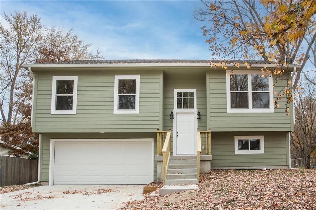 PLEASE REMOVE SHOES.Tucked away in a quiet, mature neighborhood in Lee’s Summit, this stunning new construction home combines modern efficiency with timeless charm. Featuring 3 spacious bedrooms and 2 baths, this home offers beautiful solid-surface countertops, stylish LVP flooring, and soaring 9-foot ceilings on the main level (8-foot in the lower level). The spa-like primary suite showcases floor-to-ceiling tile. Built with comfort and efficiency in mind—Low-E Energy Star windows, R-49 insulation, and a 92% efficient furnace ensure low utility costs. Enjoy the oversized lot,  large garage with insulated garage doors with floor drain, Smart Siding, 30-year roof, and Sherwin-Williams 50-year paint. Lower level storage room iis  ready for an additional bathroom. Builder thought of every detail—move in and start living your dream in this beautiful new home!