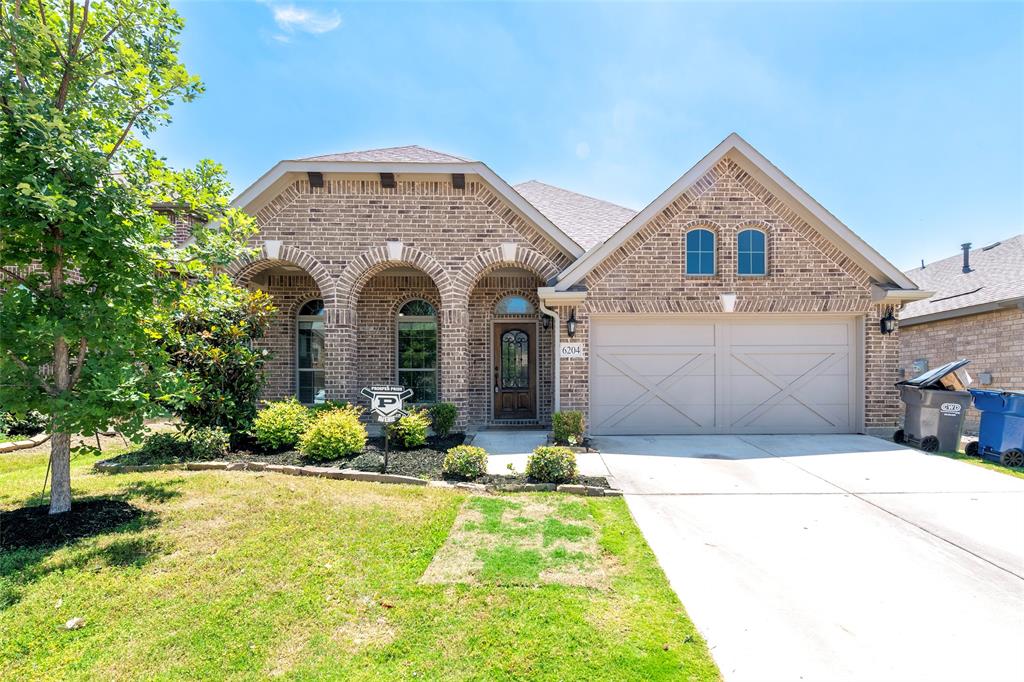 Step into your dream home at 6204 Looms Ct., nestled in the Sutton Fields community. This remarkable property seamlessly combines contemporary design with practical living, with Prosper ISD schools! As you enter, the open floor plan welcomes you, creating an inviting environment perfect for both hosting and daily life. The high ceilings add an element of sophistication, enhancing the home's spacious ambiance. The kitchen will be loved by cooking enthusiasts, boasting a substantial island with sleek quartz countertops and a gas range featuring double ovens, one of which also functions as a convection oven. This well-equipped kitchen is ready to cater to everything from casual meals to festive occasions. The primary suite serves as a personal retreat, complete with a sizable walk-in closet and a luxurious ensuite bathroom. Experience relaxation and indulgence with an oversized shower and a double vanity that bring a spa-like feel to your daily routine. Your entertainment options are extended outdoors to a spacious back patio featuring a pergola and a large hot tub, providing the perfect setting for relaxation. The backyard also houses a storage shed, adding to the property's storage options. Prepared for any power interruptions, the home is prewired for a generator hookup and comes with a generator. Ample storage is available with overhead shelves in the garage. This home also has a solarium room, ideal for a playroom, adding to the adaptable layout of the property. The surrounding neighborhood has many planned events throughout the year for neighbors to take part in. Take advantage of all the nearby community events and family friendly activities. This home is just minutes away from the Prosper Costco, restaurants and shopping in the Celina and Prosper areas! Arrange your tour today to make this extraordinary property yours and enjoy all the advantages this vibrant community offers!