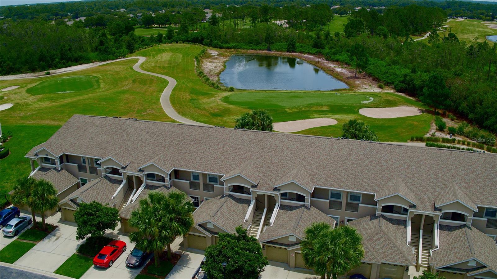 Under contract-accepting backup offers. Fantastic golf & water views from this 2nd story 2 bdr./2bath 1 car garage condo located on the 7th Green of the exclusive North Shore @ Lake Hart golf community. Truly paradise are the views from your screened balcony & the privacy to the rear w/no neighbors or rooftops! Enjoy all the luxuries of maintenance free living provided thru the master HOA & Condo association w/ 2 pools, fitness center, clubhouse, tennis/pickleball courts, basketball court, playground & ball fields & so much more. Condo fees include exterior maintenance, building insurance, & pest control. In addition to these fabulous amenities, this condo also offers quick access to Orlando's major roadways, the  airport, UCF Medical School, VA hospital, US Tennis Association main campus, amusement parks & shopping & restaurants. Features include   ceramic tile & corian countertops in the kitchen & baths & new carpet in the great room & bedrooms. The generously sized kitchen has a large pantry, plentiful counter & cabinet space, & a dinette area. The laundry room is off the 2nd bedroom/bath hallway. The master suite features trey ceilings, walk in closets, dual sinks + oversized shower. Top Lake Nona schools! Don't miss your opportunity to live or invest in this perfect gated golf community! Welcome Home!!!