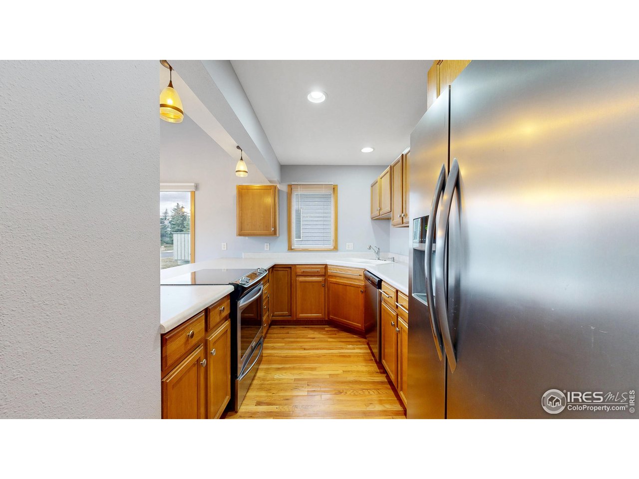 This is move-in-ready 1555 Raven Cir C, a comfortable and inviting condo in the Ranch Meadows neighborhood of Estes Park. The kitchen opens to the living room, creating an easy flow for cooking, dining, and gathering around the gas fireplace on cool evenings. Updated appliances, clean finishes, and thoughtful touches throughout make this condo truly move-in ready. Step outside onto your private deck and take in the views of Twin Sisters and the Continental Divide. Whether you are enjoying morning coffee, spotting wildlife, or watching a mountain sunset, the view never disappoints. With three bedrooms and two bathrooms, there is space for family, guests, or even a home office. Located just minutes from downtown Estes Park, this home offers quick access to local dining, shopping, Rocky Mountain National Park and the endless outdoor adventures that define life in the Rockies. Whether you make it your full-time residence or a peaceful mountain getaway, 1555 Raven Cir C offers a comfortable, easygoing lifestyle surrounded by some of Colorado's most inspiring scenery.