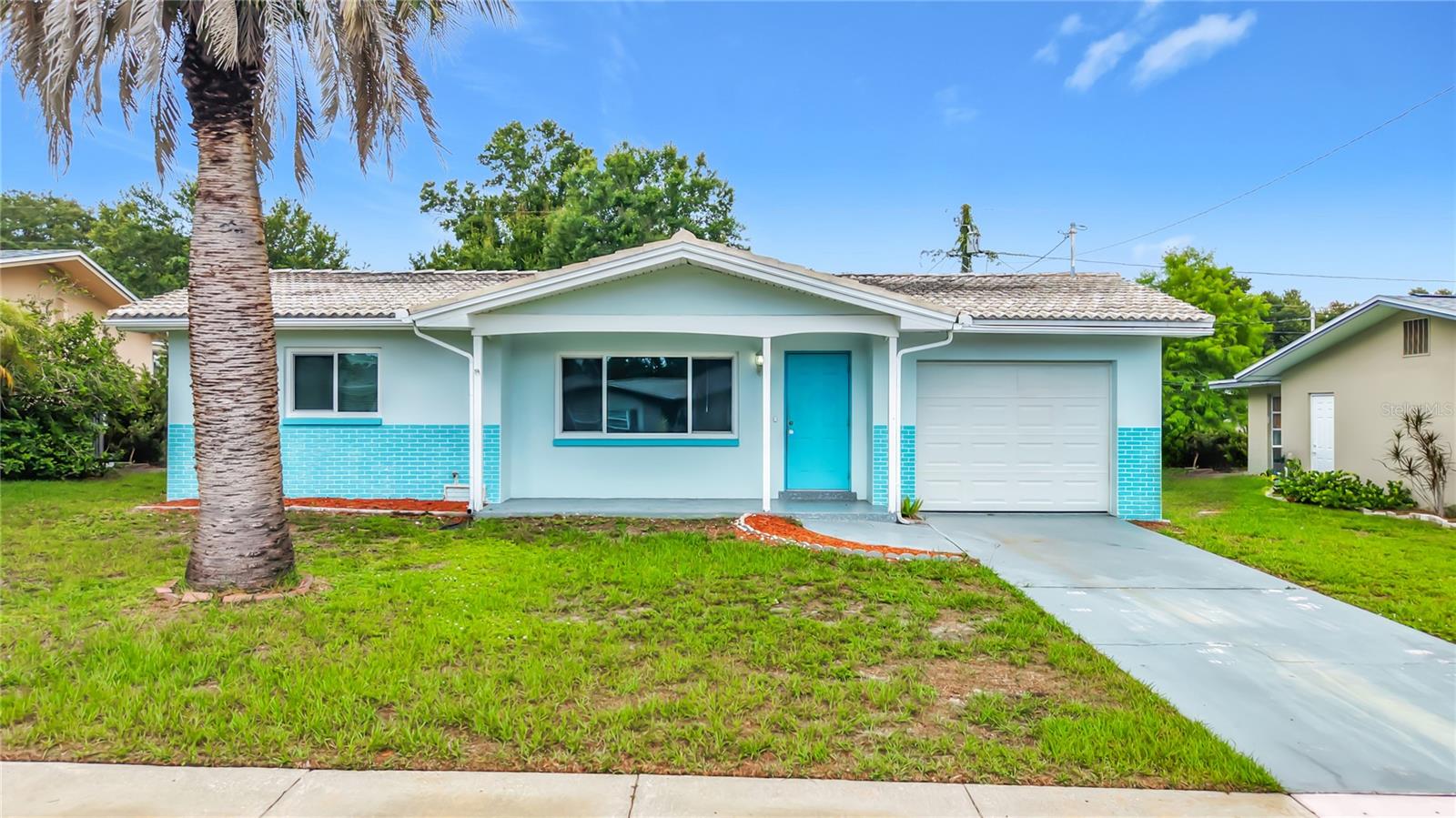 Virtually Staged. Discover the perfect blend of modern updates and Florida charm at 890 7th Ave NE in Largo, FL 33770. This beautifully refreshed one-story 3-bedroom block home offers comfortable, low-maintenance living with an attached garage, a spacious living room, and a relaxing rear Florida room ideal for enjoying the sunshine and breezes.Step inside to find stylish wood-look laminate flooring flowing throughout, an updated kitchen featuring shaker cabinets, elegant granite counters, and stainless steel appliances, plus a fully updated bathroom. 2020 A/C system and a durable 2004 tile roof, ensuring peace of mind and efficiency for years to come.Located in a convenient Largo neighborhood with easy access to everyday amenities, this home places you near excellent local parks and just a short drive from world-class attractions. Within 20 miles, enjoy the stunning white-sand beaches of Clearwater Beach (about 5-6 miles away) and Indian Rocks Beach, known for their vibrant atmosphere, sunsets, and water activities like dolphin cruises and parasailing.Explore the Florida Botanical Gardens and Largo Central Park right in Largo for free or low-cost outdoor fun, including gardens, playgrounds, and scenic walks. Nearby highlights include Heritage Village for history, Walsingham Park and Eagle Lake Park for nature trails and wildlife, the Dali Museum in St. Petersburg (around 15 miles), and vibrant spots like John’s Pass Village or Pier 60 for dining, shopping, and entertainment.Whether you're seeking a peaceful retreat or an active lifestyle with easy access to Tampa Bay’s best beaches, parks, and cultural destinations, this updated Largo home delivers it all in a prime location. Welcome home to Florida living at its finest!