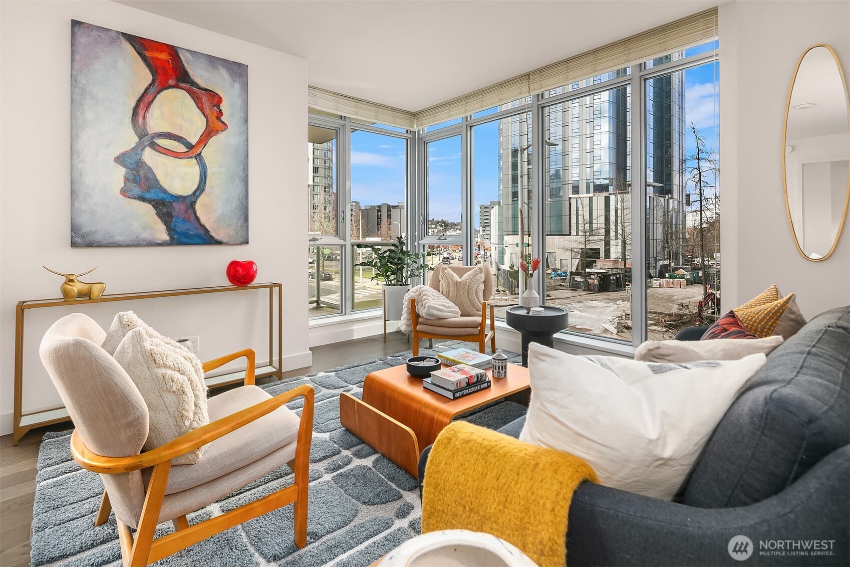 Incredible opportunity to own a 2 bedroom, 2 bath NE corner Insignia unit for a price historically associated with a 1-bedroom. Floor-to-ceiling walls of windows throughout provide abundant natural light and frame an ever-changing vibrant city scene, with picturesque tree-lined streets and luxury new buildings. Open great room floorplan with large covered deck is ideal for entertaining. Gourmet kitchen with sleek cabinetry, gas range & quality appliances. Bedrooms are on opposite sides of unit for ultimate privacy, and both offer big walk-in closets so storage won’t be an issue. Unit, garage parking spot and storage are all on the same floor, no need to use the elevator! Insignia is known for its vacation-like amenities that pamper & refresh: 2-level gym with yoga & Pilates studio. Spa with indoor swimming pool, hot tub, dry sauna & steam room. Movie theater. Helpful 24-hr concierge. Multiple roof-top sky lounges with the best views of the city. Pet retreat & grooming spa. Private open air resident park. Bicycle room, car wash, EV charging stations, shared garden & more! Located in the heart of South Lake Union, just steps from everywhere you want to be. Orange Theory, Fulcrum Coffee, Sushi by Scratch & Maiz in base of building. Walk to the Amazon Spheres, Pike Place Market, the waterfront, Whole Foods & several nearby dog parks.