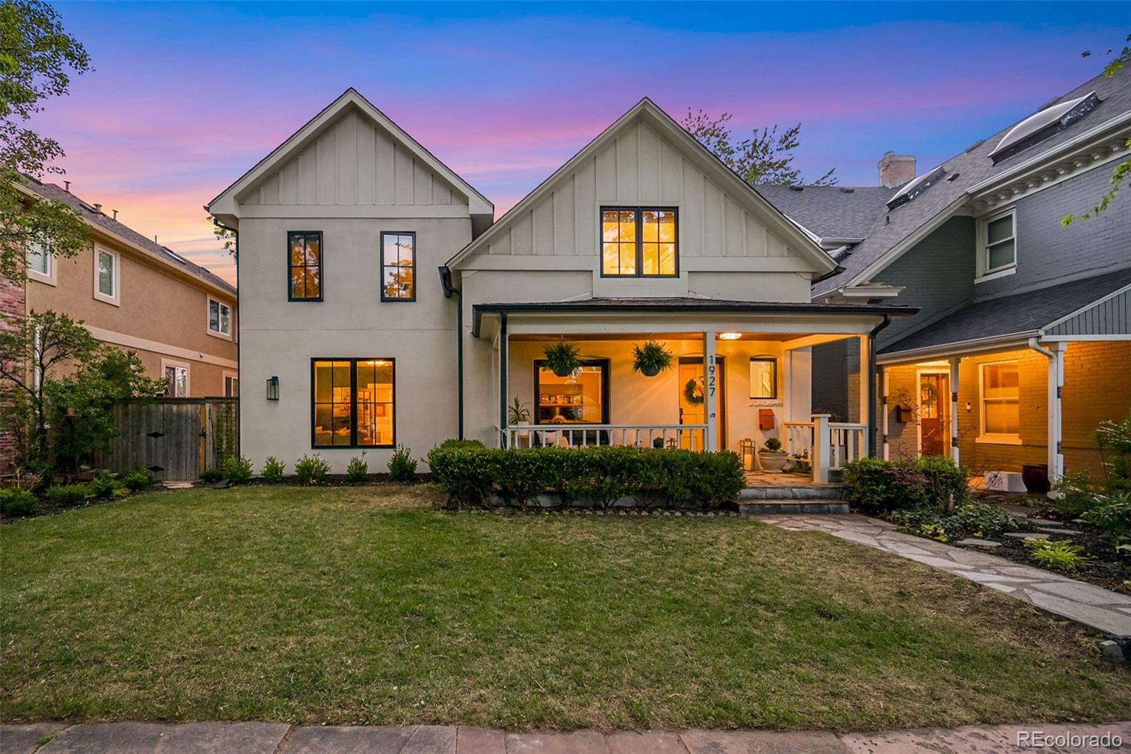 The 3-bedroom, 3-bath home spans 2,900 square feet and was thoughtfully designed with an emphasis on craftsmanship, functionality, and elevated finishes. Stepping in from the covered front porch, you'll notice tall ceilings with exposed wood beams, warm rift & quarter sawn white oak throughout the main floor, and a generously sized office near the front of the home. The heart of the home is the custom kitchen with dovetail soft-close cabinetry, leathered Nero Orion granite countertops, coffee bar w/wine fridge, carbonated tap at the sink, and a reverse osmosis system servicing the dedicated sink tap, fridge, and pot filler. High-end stainless steel appliances complete the space, including the sought-after Blue Star oven. A built-in desk space sits adjacent to the kitchen, along with a large mudroom closet with bench and built-ins. In the family room, eyes are drawn immediately to the Santa Barbara finish fireplace and oversized French doors opening to the covered back patio. Adjoining this room is the bonus living area with built-in wiring for a movie theater, crafts, office, or gym. Heading upstairs, the primary retreat features an oversized walk-in closet and serene five-piece bath with expanded shower and privacy window at the tub. Two well-sized bedrooms, a full bath, office nook w/skylight, hallway closets, and convenient laundry space complete the second floor. // Out the French doors, step onto the freshly painted deck and covered patio, complete with shading and a mist line for hot summer days. The yard features red flagstone patio space, water features, and extended garden beds along the north side of the home. The oversized two-car garage and attached shed provide ample storage beyond the already well-appointed interior. Just a half block from South Pearl Street’s favorite restaurants and shops, this is a rare opportunity to own a thoughtfully renovated home in an exceptional location.