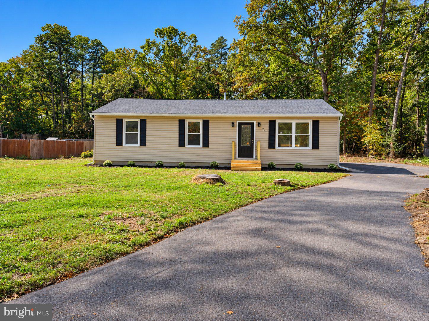 **NEW UPDATES, PLENTY OF SPACE & ALMOST AN ACRE OF LAND!** Welcome to 367 Broadlane Road in Williamstown! This beautifully refreshed 3-bedroom home offers a bright, open-concept living, dining, and kitchen area perfect for everyday living and entertaining. Enjoy brand-new flooring, fresh paint, a gorgeous updated kitchen with new appliances, and an updated bathroom. A separate mudroom/laundry room and storage attic add extra convenience. **Major improvements include a NEW ROOF, NEW HVAC, and NEW HOT WATER HEATER!** Step outside onto the huge rear deck overlooking a spacious lot of nearly an acre, offering plenty of room to relax, entertain, or enjoy the outdoors. A wraparound driveway provides ample parking and easy access. Tucked away in a peaceful Williamstown setting, yet convenient to shopping, dining, local wineries, Scotland Run Park, and major roadways. **As an added bonus, the seller is offering a ONE-YEAR HOME WARRANTY for extra peace of mind!** With the big-ticket updates already completed, all that's missing is you! **Schedule your private showing today!**Some photos have been virtually enhanced to illustrate furniture placement. Home is not furnished.