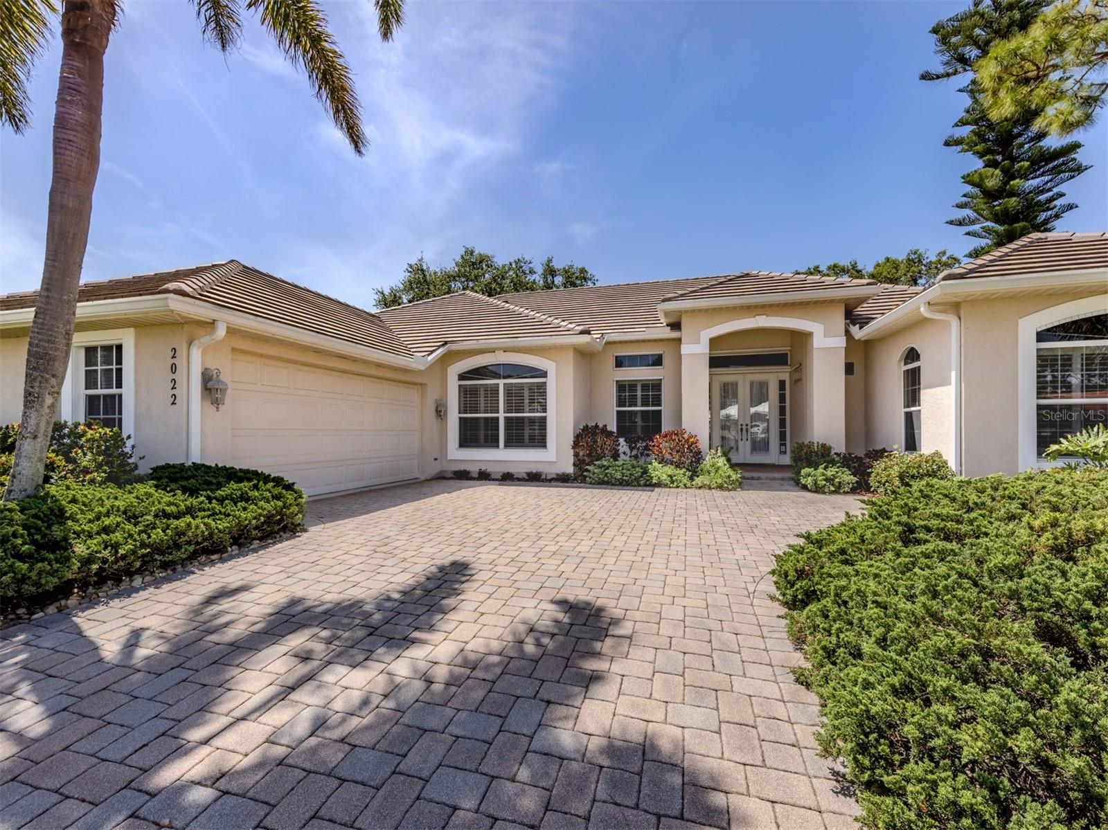 Under contract-accepting backup offers. Experience luxury living in this beautiful custom home, perfectly positioned with serene views down the 11th fairway and a peaceful lake. Boasting spacious bedrooms, a private study, versatile bonus room, and a split floor plan ensuring privacy, this residence offers both comfort and flexibility.