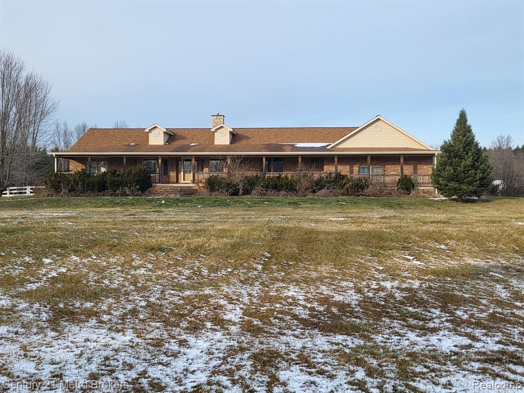 This wonderful 2588 sq. ft. ranch with a full length covered porch (new concrete and brick facing) and 3 car attached garage sits on a 10 acre parcel less than 1/3 mile from a paved road. It boasts a spectacular 2-sided stone fireplace in the large great room. Also, a master bedroom suite with a jetted tub. The full basement has 9 foot ICF Foam insulated concrete walls and a full bathroom. There is also a full bath in the laundry room near the entrance from the garage The nearby walking/hiking path crosses the back corner of the property. The paved driveway extends all the way to the 42 ft x 76 ft pole barn with electricity and 20 ft sliding doors at each end. There is also an additional 9 acre parcel on the east side of the property available for sale under Listing #20251045070. Being sold as is. BATVAI. All measurements are estimated. Information deemed reliable but not guaranteed.
