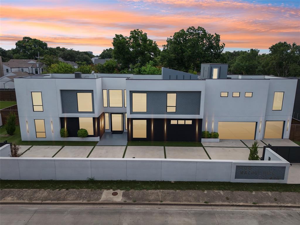 his Preston Hollow sleek modern home is meticulously designed, leaving no detail overlooked. Enter through the grand entrance & you are greeted by an open floor plan w. stunning white oak floors. The kitchen showcases Viking appliances & features stunning translucent countertops, casting a soft glow on the exquisite Quartzite surfaces. Check out the prep kitchen nicely secluded behind the pantry. The living spaces are thoughtfully designed for comfort and style w. an abundance of natural light. The primary suite is a sanctuary of luxury, featuring a lavish ensuite bathroom w. soaking tub, 2 walk-in showers & 2 vanities. Walk up illuminated stairs & find secondary beds, game & media rooms. Continue up to the turfed rooftop & enjoy the outdoor media area for watching the game. Finally, go outside & find a retreat to relax & entertainment & a sparkling pool that beckons you for a refreshing dip. Located with access to premier schools, restaurants, & shopping.