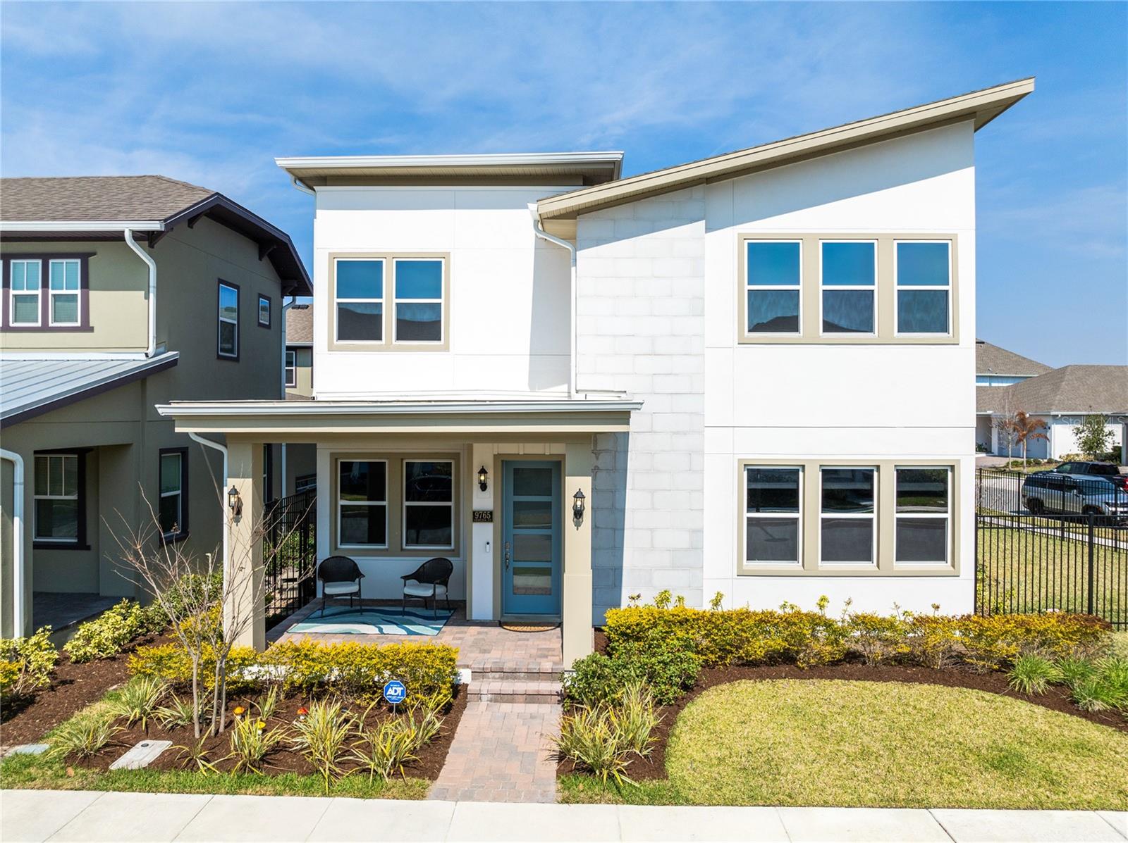 Located on a desirable corner lot in Laureate Park, this beautifully designed home offers flexible living, modern finishes, and the added benefit of a detached garage apartment. The open concept main living area features abundant natural light, neutral finishes, and seamless flow between the living room, dining space, and kitchen, creating an inviting environment perfect for both everyday living and entertaining.The first floor primary suite provides a private retreat with a tray ceiling, generous space for a sitting area, and large windows that fill the room with natural light. The spa inspired bathroom features a dual sink vanity, modern cabinetry, and an oversized glass enclosed shower with stylish tile finishes and a luxurious rain shower head. Two spacious walk in closets provide excellent storage and organization.Upstairs, a large loft offers flexible living space that can serve as a media room, playroom, or home office. The second floor also features three additional bedrooms. Two of the bedrooms share a convenient Jack and Jill bathroom, while the third bedroom includes its own private ensuite bath, creating comfortable accommodations for family members and guests.Outdoor living is equally impressive with a spacious covered lanai that creates a private courtyard style setting between the main home and the detached garage apartment. This outdoor space is perfect for entertaining, offering room for both dining and lounge seating while maintaining a comfortable shaded area for relaxing or hosting guests.The detached garage apartment adds incredible versatility and value to the property. This private one bedroom apartment features a full kitchen with stainless steel appliances, a separate living room, dining area, private bedroom, full bathroom, and its own laundry. Whether used for rental income, extended family, or a private guest suite, the apartment offers flexibility that is highly sought after in Laureate Park.Laureate Park isn’t just a neighborhood it’s a vibrant lifestyle. Enjoy the Aquatic Center, resort style pools, LP Fit gym, and 44 plus miles of trails. Located in prime Lake Nona, minutes from Medical City, the VA hospital, Nemours, dining, and shopping. Close to major highways, Orlando International Airport, and the USTA National Campus. Easy access to Orlando’s top theme parks and beautiful Florida beaches. This home blends space, flexibility, and community in one of Lake Nona’s most sought after neighborhoods.