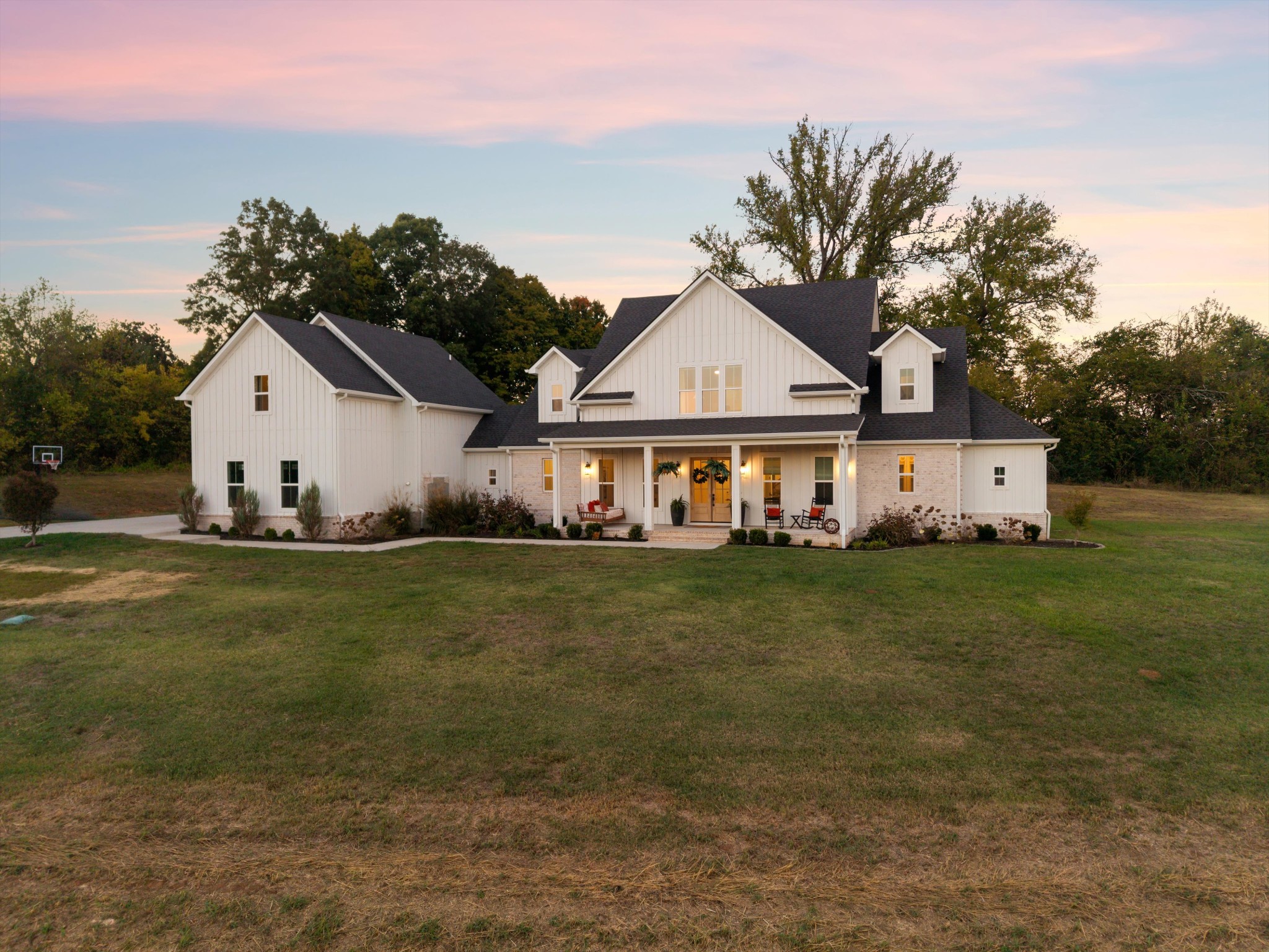 Spanning approximately 31 acres in Maury County, this distinctive estate presents a rare opportunity to combine private estate living with an established hospitality operation and room for future growth.The newer constructed 4,524-square-foot primary residence anchors the property and is complemented by four additional fully furnished residences featuring a mix of cabin and farmhouse character. Together, the five homes offer exceptional flexibility for multigenerational living, guest accommodations, private retreats, or continued short-term rental use.The secondary residences have an established history as short-term rental accommodations, earning outstanding guest reviews and attracting strong occupancy. For buyers looking to build on that foundation, the property's acreage and existing improvements also present an opportunity to explore future event-space expansion. Beyond the residences, the property includes four barns, a substantial 48' x 100' shop with electrical service and exterior plumbing access, two RV pads with a history of consistent bookings, and a stocked pond. These amenities provide a versatile foundation for a range of hospitality and recreational uses.Whether continuing the existing hospitality operation, creating a private retreat destination, or expanding the property's gathering and event capabilities, this unique estate offers a combination of established use, substantial infrastructure, and opportunity for the next owner to shape its future.Secondary residence square footage is not included in MLS. See brochure attached for more details on each residence.