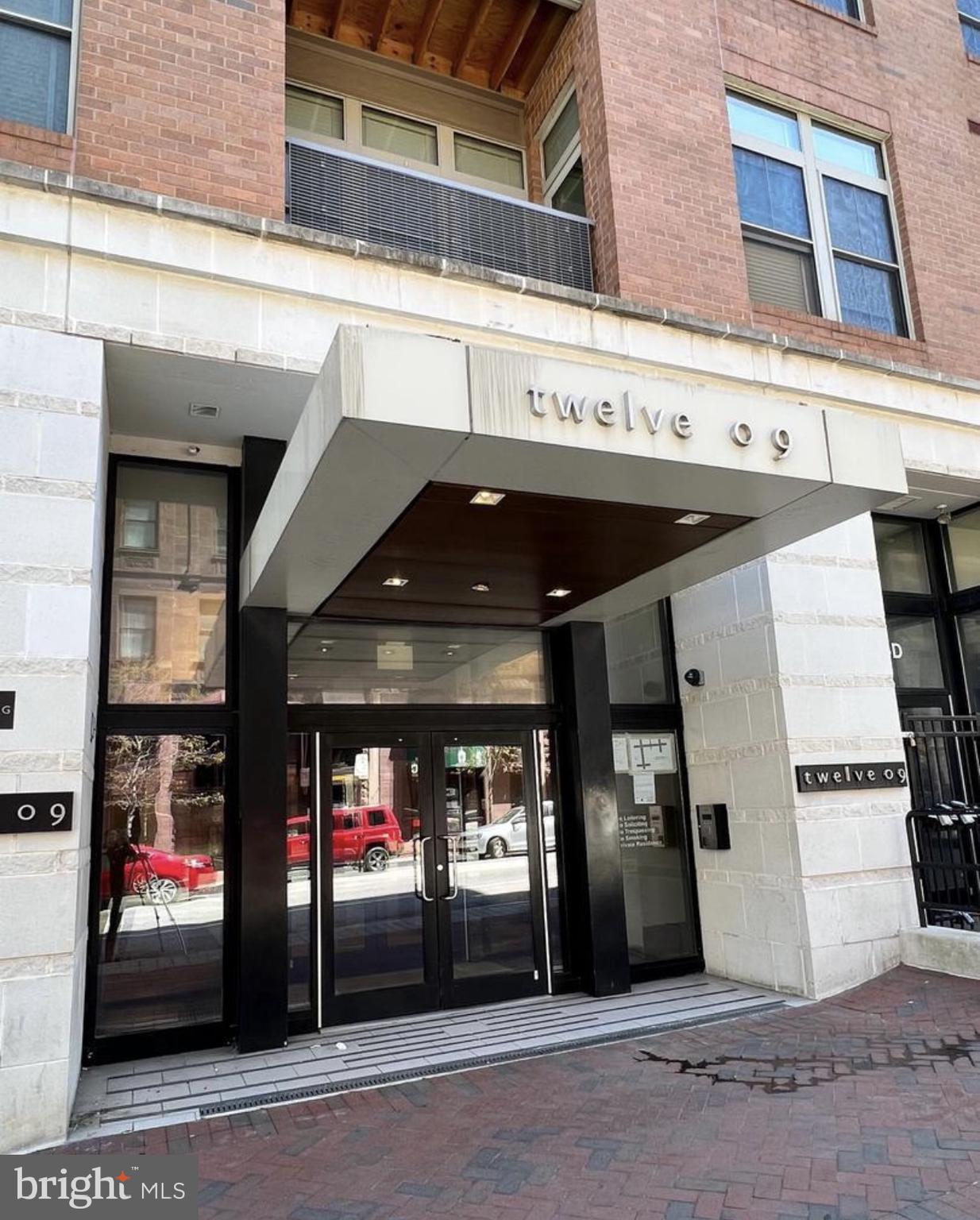 Available for Immediate Move-in! Occupancy comfortably fits three. $995 per person a month-- all utilities included! Welcome to 1209 N Charles Street Unit #209! Fully Furnished 1BR/1BA Condo in Mount Vernon! Condo Fee, Parking, and Utilities included in monthly rent! 973 square feet. Move-in ready and located in the heart of Baltimore's vibrant Mount Vernon neighborhood, this 1-bedroom, 1-bathroom condo includes all utilities for hassle-free living. The unit comes complete with linens, towels, kitchenware, appliances, in-unit washer/dryer, and a television - just unpack and settle in!The building offers exceptional amenities, including a fitness center, courtyard terrace, Amazon digital package locker, and attached garage parking (1 spot included). Ideal for students, traveling professionals, or anyone seeking turnkey city living. Enjoy unbeatable proximity to restaurants, nightlife, cultural landmarks, I-83, and Penn Station for easy commuting.Unit Features:Fully furnished -- couch pulls out and converts into an additional bed (for third person)All utilities included (plus high-speed internet & streaming TV services) Kitchen appliances & housewaresTV, linens, and towels providedIn-unit Washer & Dryer1 garage parking spaceIn-building gym, outdoor terrace, secure package locker(Maximum Occupancy 3)Month to Month Lease Accepted Don't miss this excellent rental opportunity in one of Baltimore's  most desirable urban neighborhoods. Available now. Schedule your showing today!