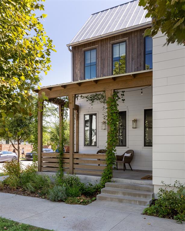 Positioned on a standout corner lot in the highly lifestyle-rich Wheeler District, this two-story residence blends stylishcraftsmanship with an inviting layout designed for easy, elevated living. The exterior pairs Montana Timber Artisandetailing with durable James Hardie siding, showcasing the neighborhood's signature architectural charm. A wide frontporch welcomes you inside, where an airy entry introduces a spacious Kitchen wrapped in windows. Generous prep areasand sunlight from every angle make this space ideal for cooking, gathering, or simply enjoying the views. The kitchenconnects effortlessly to a comfortable living area that opens onto a private courtyard-complete with matching indoor andoutdoor fireplaces for year-round ambiance. The upper level features a dramatic vaulted owner's suite, a well-placedutility room, and smart additional spaces throughout the home, including a mudroom, pocket office, and a versatile flexnook that adapts to your needs. Life in the Wheeler District delivers the full experience of a connected, community-centered neighborhood. Specialty shops, local eateries, pubs, and entertainment venues are all steps from the front door,making spontaneous outings and daily conveniences part of the routine. End your evenings on the back patio, where theoutdoor fireplace offers the perfect setting for relaxed conversation or quiet moments under the sky. This home capturesthe essence of Wheeler-thoughtful, stylish, and effortlessly close to everything. VA ASSUMABLE LOAN AT 2.75%