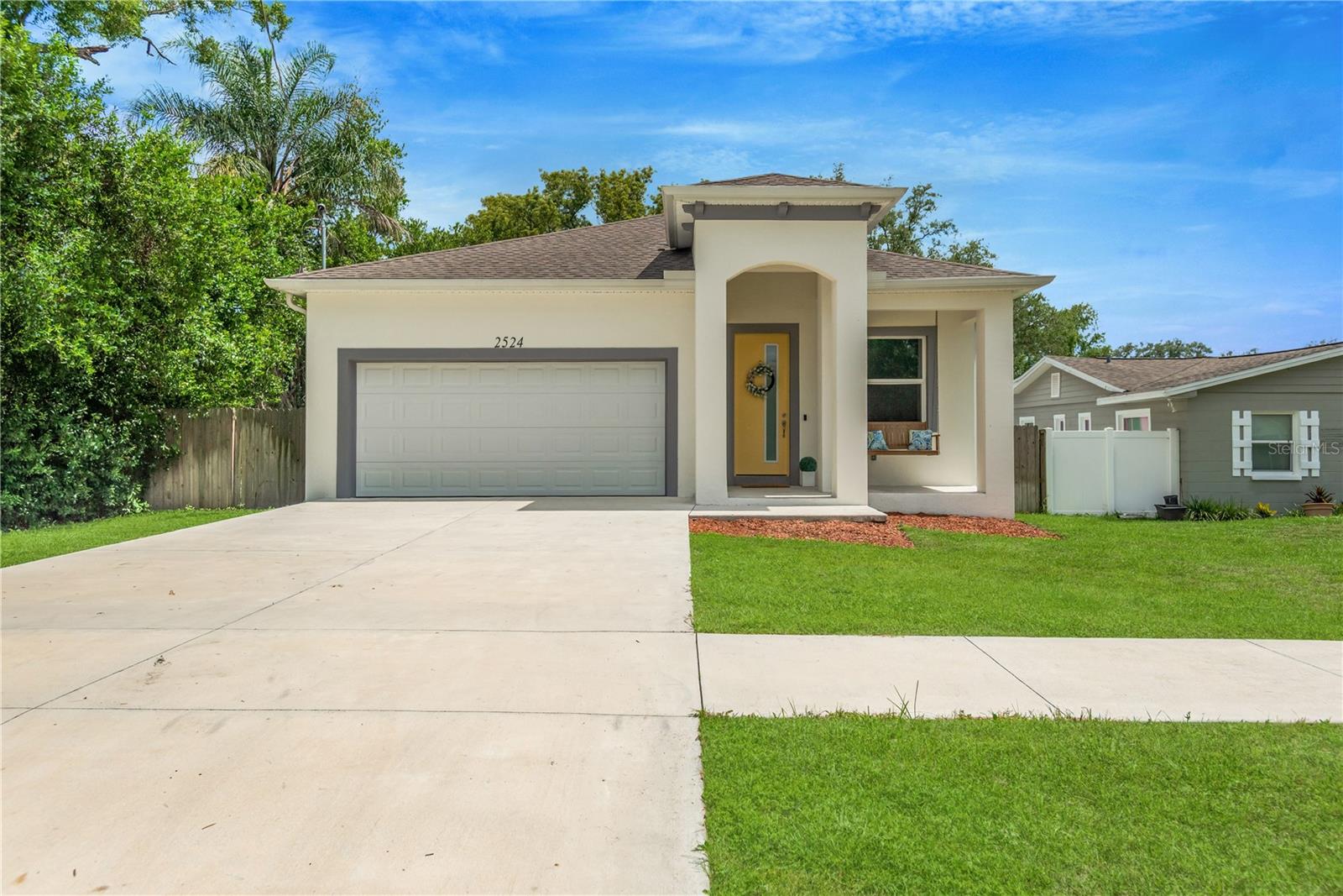 Welcome to 2524 Lake Ellen Ln, Tampa, FL 33618—an exceptional 2022-built residence that blends modern craftsmanship with refined simplicity, all set in a highly desirable Tampa location with no HOA, no CDD, and no Flood zone. This stunning 3 bedroom, 2 bathroom, 2 car garage property boasts 1,872 sq. ft. of thoughtfully designed living space.  This home delivers the elevated feel of newer construction paired with effortless livability. Every major system—including HVAC and core 4-point components—reflects the quality and peace of mind expected from a recently built home. No carpet - ceramic tile flooring. Inside, expansive living spaces are complemented by hurricane-impact windows that enhance both security and energy efficiency while allowing natural light to flow throughout. The washer and dryer are included for added convenience, making the home truly move-in ready. You'll immediately FALL IN LOVE as you step outside to the senstaional outdoor area. The charming oversized lanai and expansive yard area is designed for entertaining.   Set in a prime Tampa location, this residence offers a rare combination of architectural freshness, clean design, and freedom from restrictive HOA and CDD oversight. A polished, contemporary home that delivers both comfort and understated exclusivity—ideal for those seeking refined living without compromise.