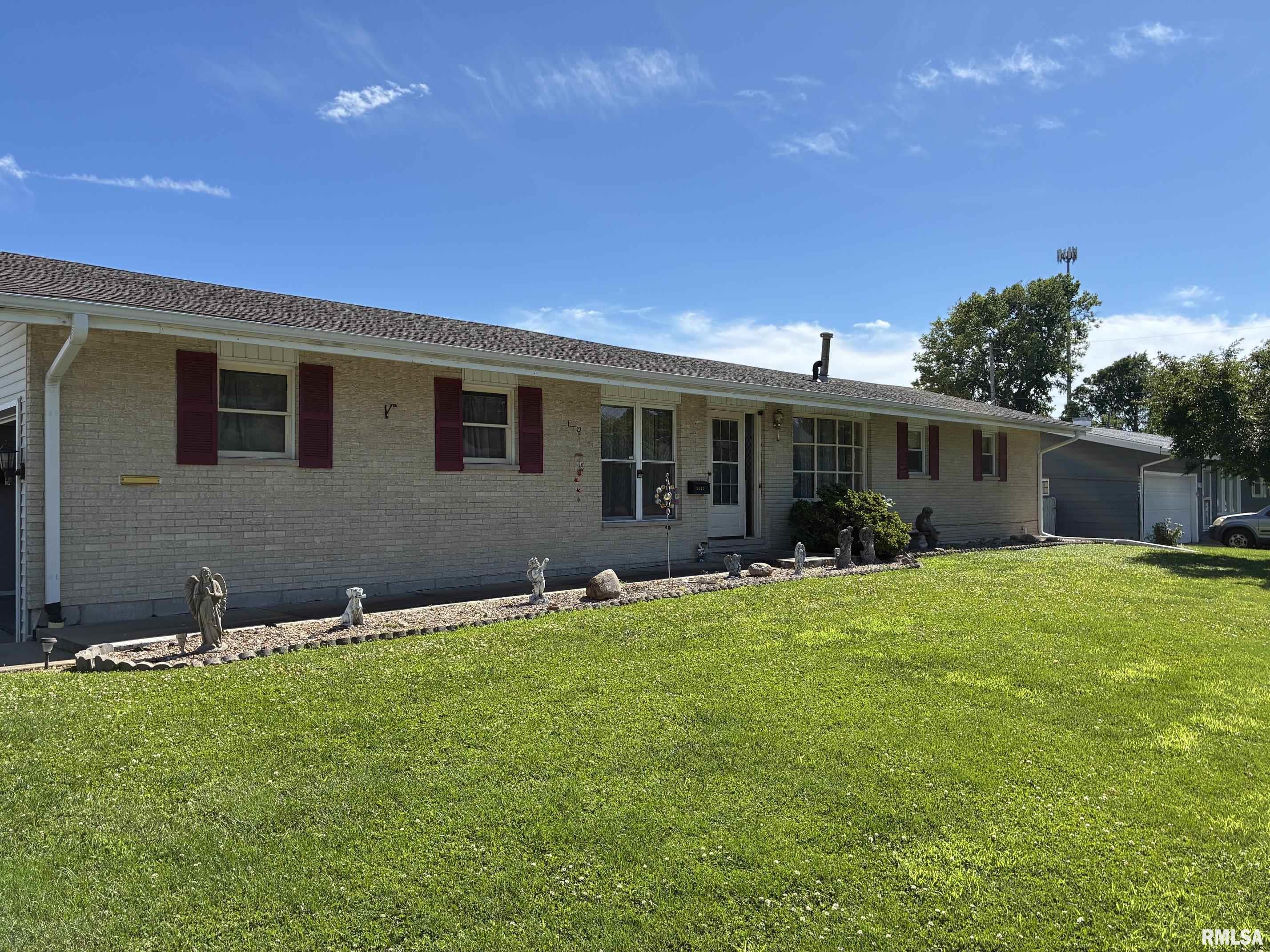 Welcome home to this well-maintained 2-bedroom, 2-bath brick ranch in a highly desirable location close to shopping, restaurants, theaters, and everyday conveniences. Offering the ease of one-level living, the main floor features a spacious layout with main-floor laundry, neutral décor, and energy-efficient vinyl replacement windows throughout.  The updated kitchen boasts beautiful honey oak cabinetry and ample workspace, while the dining area opens through French doors to a covered patio—perfect for outdoor dining and entertaining. All appliances convey including stove, refrigerator, microwave, dishwasher and stackable washer and dryer.  A bright and inviting sunroom provides additional living space to enjoy year-round.  The main level also includes a walk-in shower for added convenience and accessibility. Downstairs, you'll find a large family room ideal for gatherings, a second kitchen that offers excellent flexibility for entertaining or extended living arrangements, and a full bath featuring a relaxing jetted tub.  Additional highlights include a 2-car attached garage, a large parking pad for extra vehicles, and the durability and curb appeal of a brick exterior. This move-in-ready home combines comfort, convenience, and versatile living spaces in an outstanding location.