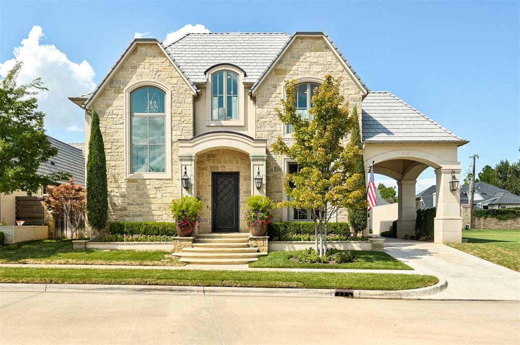 Built by Kent Hoffman, this French Country showpiece in Nichols Hills’ coveted Cumberland Court offers curated, high-end living — with every detail dialed in. It's the ultimate lock-&-leave lifestyle in one of the most exclusive enclaves. Grand symmetry, stucco & natural stone, & magazine-worthy curb appeal set the tone for the design inside. Flexible floorplan has 4 bedrooms or 3 bedrooms plus a flex room (currently a quilting room), 3 living + office & bonus play/workout/media room. Herringbone white oak floors, soaring ceilings, and custom millwork anchor the living spaces, while the chef’s kitchen has Thermador appliances, a Galley workstation sink, Taj Mahal quartzite, custom Wood Mode cabinetry, built in vegetable steamer, & double ovens, each with convenient side-swing doors, coffee bar & a back-kitchen/scullery with pantry space + home-management station. The open living area has a cast-stone fireplace with 12' ceilings & 10' windows, & flows to the heated all-season patio with retractable screens, perfect for year-round entertaining. Motorized blinds on 10' windows offer effortless light & privacy control. The primary suite is a private retreat: heated bathroom floors, Esmeralda marble, and a custom Inspired Closets design that has all the bells & whistles. Additional highlights include a built-in dining room display cabinet with unexpected depth, a hidden nook in the pantry, abundant storage, a whole house Generac generator, DaVinci roof, & dual Tesla chargers in the garage. Cumberland Court HOA provides Nichols Hills only luxury concierge services including daily plant watering, handyman services, patio cleaning/pressure washing, mail/package services, weekly lawn maintenance and much more! Walk to Trader Joe’s & Starbucks, you're steps from Nichols Hills Plaza, Whole Foods & Classen Curve. Rare blend of privacy, convenience, & unmatched craftsmanship in Nichols Hills’ most sought-after location.