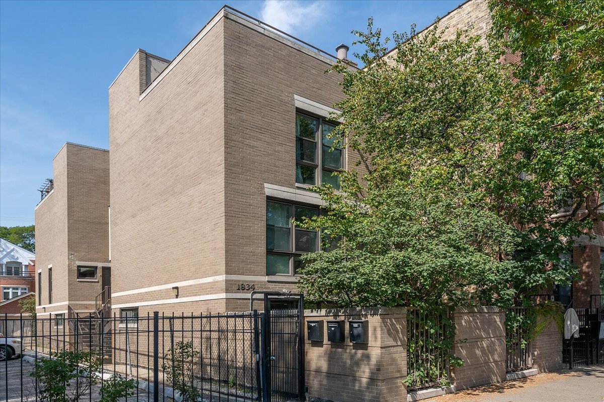 Welcome to this bright and inviting 2 bedroom, 2 bathroom condo, perfectly situated in the heart of Lincoln Park. This home offers the perfect mix of charm and convenience. As you step inside, you're greeted by a spacious living area filled with natural light, anchored by large windows that showcase the private outdoor garden patio. The modern kitchen features quartz countertops, stainless steel appliances, and new cabinets, making meal prep both stylish and functional. The open concept living and dining area makes entertaining a breeze. Both bedrooms are generously sized with plenty of closet space. The primary bedroom has an en-suite bathroom and a full wall closet complete with organizers and built-ins. Additional features include in-unit laundry, central heating and cooling, and an exterior parking space so you'll never worry about parking in this popular neighborhood. Situated near the Steppenwolf Theatre and Oz Park, you'll enjoy trendy restaurants, boutique shopping, cozy cafes, and vibrant nightlife right outside your door. The Armitage Brown Line, Halsted Bus and the North/Clybourn Red Line provide great public transit options! This condo combines modern amenities, functional space, and an unbeatable location; don't miss your chance to call 1834 N Halsted your new home in Lincoln Park!