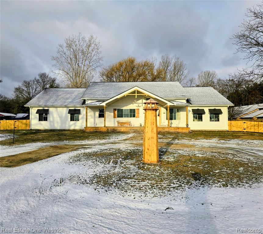 Dream yard in historic Clay Townhip on 4.9 acres backing up to 1500 beautiful acres of state land. Take a 700ft stroll in your back yard and you will find the paved bridge to bay walking trail. This trail can take you into the (going north) Algonac State Park or (going south)directly in to the heart of Algonac. Less then 100 steps away out the front door and you will arrive at the Algonac Beach. Perfect for swimming, fishing, sight seeing or put your watercraft into the water and ride the waves. Views from the east and north end of the home are spectacular for boat watching. When taking the trail in to the Algonac State Park, buyers can enjoy many of the amenities. This conventionally built (year 2025) 3010sqft barndominuim has room for everyone. Features include encapsulated crawlspace, rough cut Tennessee oak hardwood floors, 12ft ceilings, marble bathrooms, solid wood cabinets, marble counter tops, smart appliances, chefs stove, skullery, tankless water heater, energy efficient furnace, insulated garage doors, 200 amp service, heated, cooled and insulated garage, privacy fencing, huge front porch, circular driveway, spacious rear patio, 24x40 3 bay garage and beautiful exterior lighting. Home is zoned single and multifamily. This home offers some of the best the area has to offer!